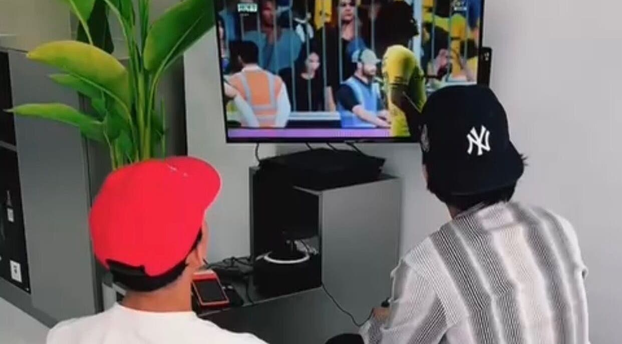 Guests enjoying video games at Human Barber Club Vol 2, offering a relaxed vibe in Bali, Bali, ID.