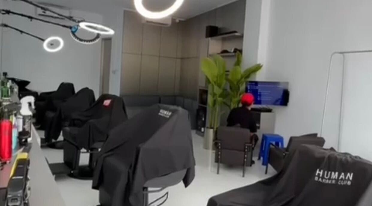 Modern interior of Human Barber Club Vol 2 in Bali, Bali, ID with stylish seating and lighting.