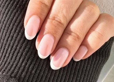 Stylish French manicure at Beauty Box Spa, Bracknell, England, GB, showcasing pink and white nails.