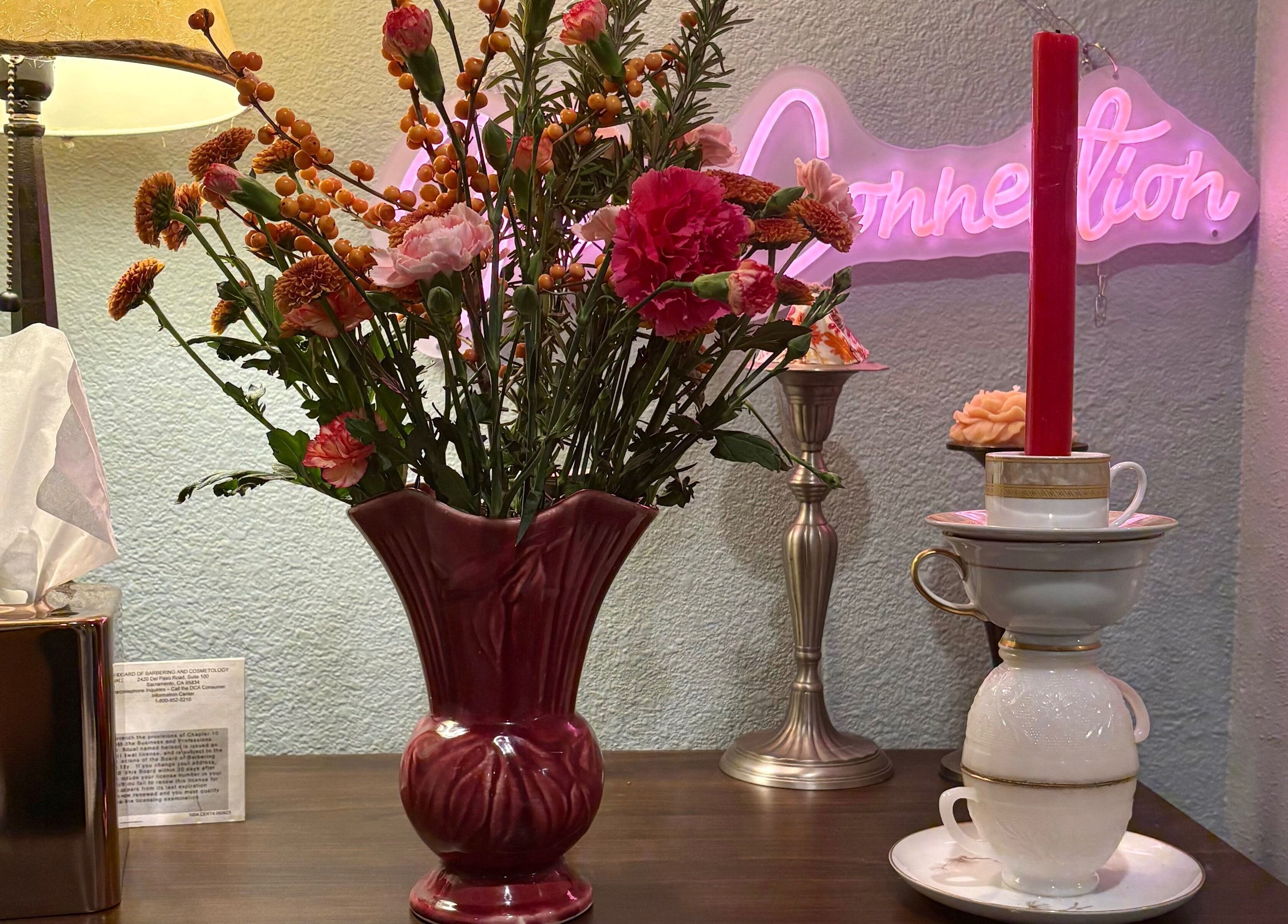 Beautiful floral arrangement and decor at Glow Connection, Loomis, California, US enhancing spa ambiance.