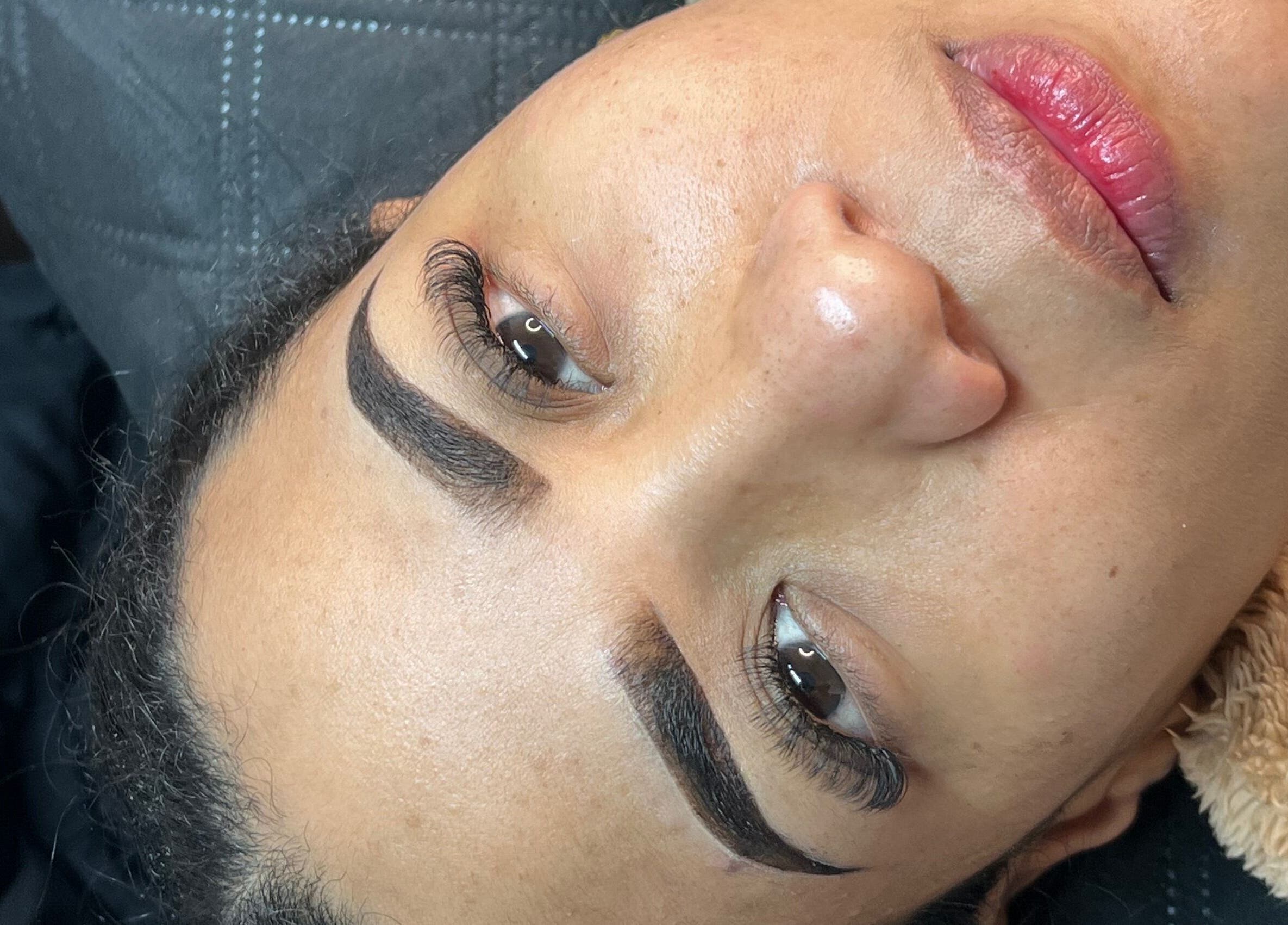 Perfectly groomed eyebrows and lashes at Carli Brow Lab, Lowell, Massachusetts, US.