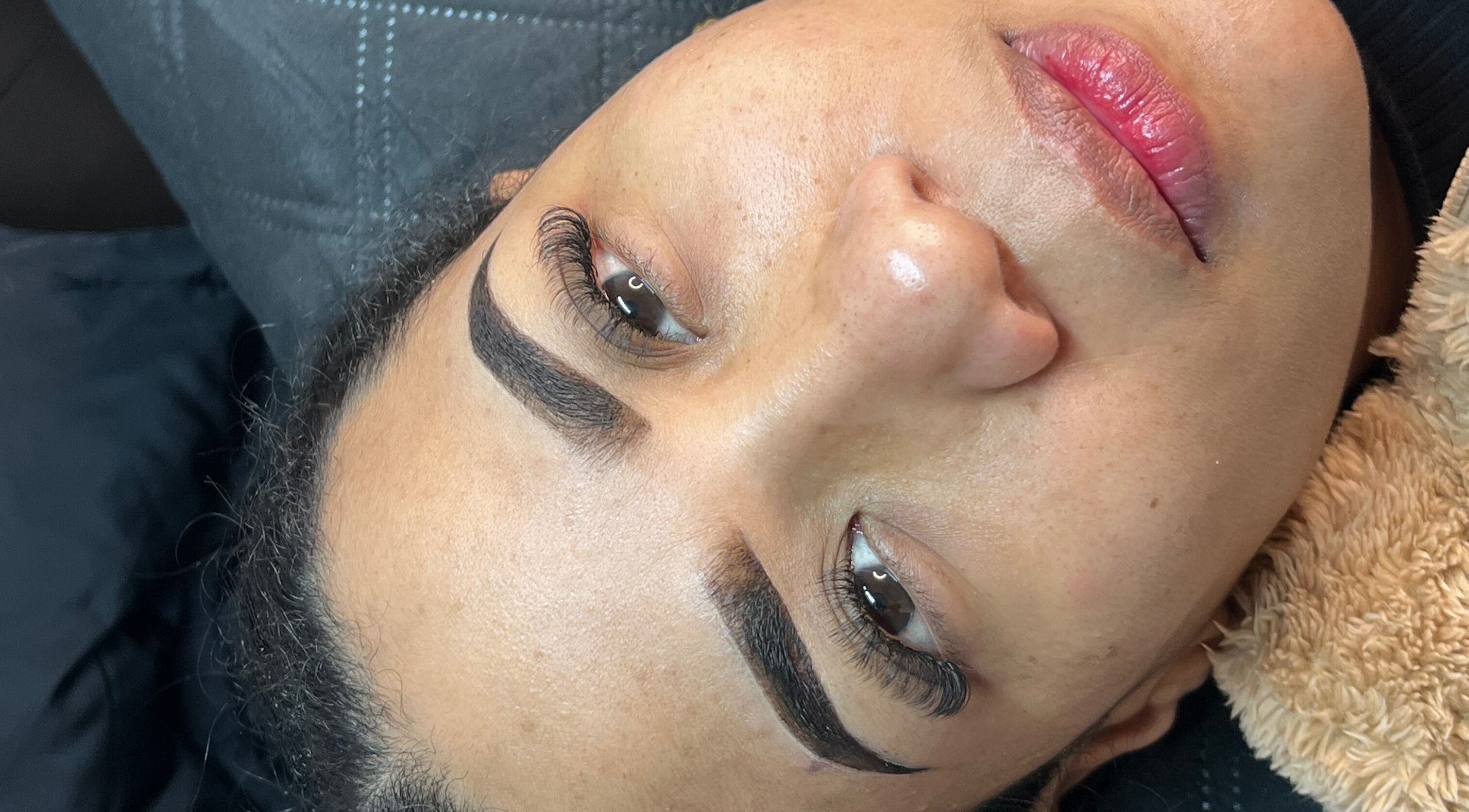 Perfectly groomed eyebrows and lashes at Carli Brow Lab, Lowell, Massachusetts, US.