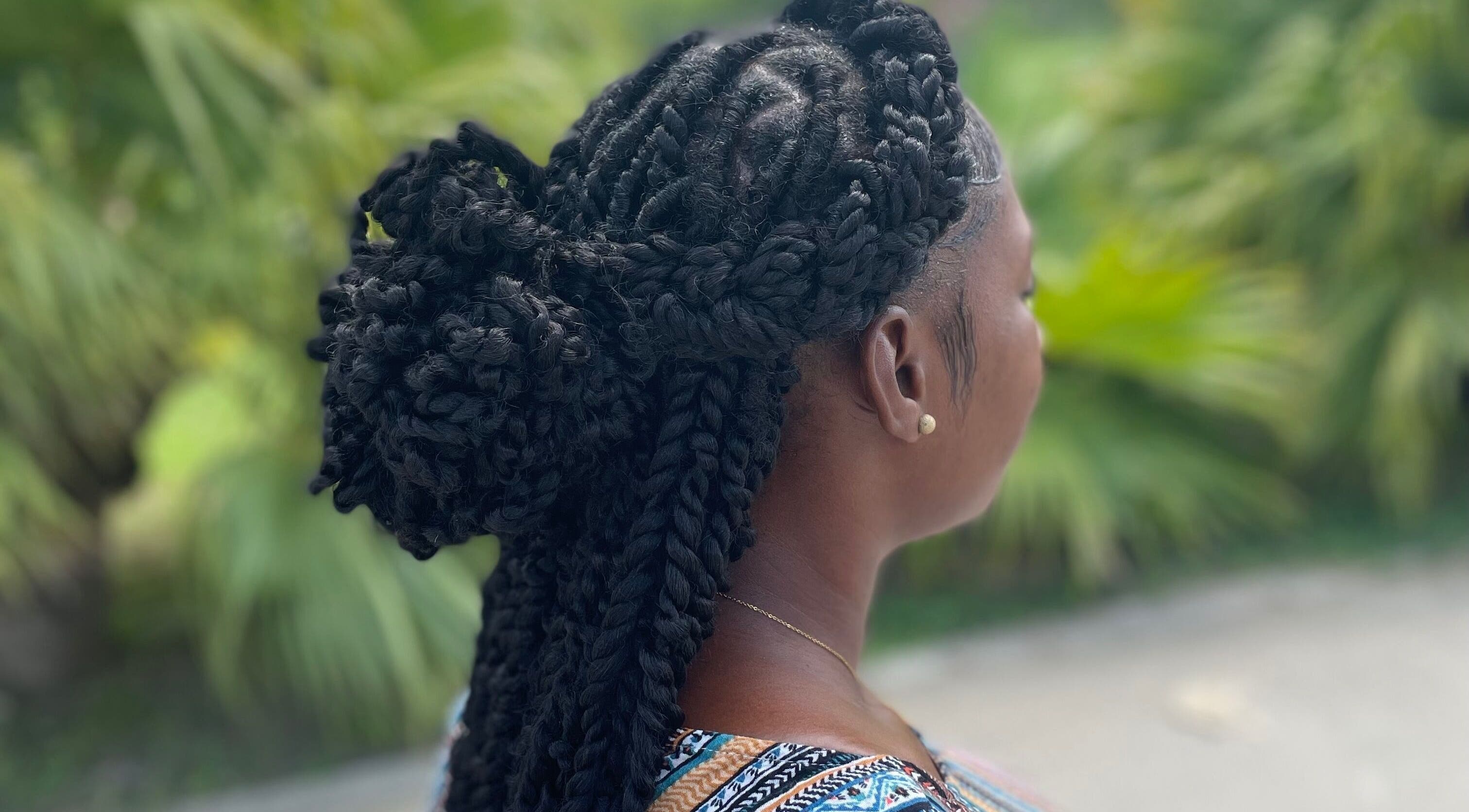 Intricate braided hairstyle from Kyng’s Hair Care in Saint John's, Saint John, AG offering expert styling.