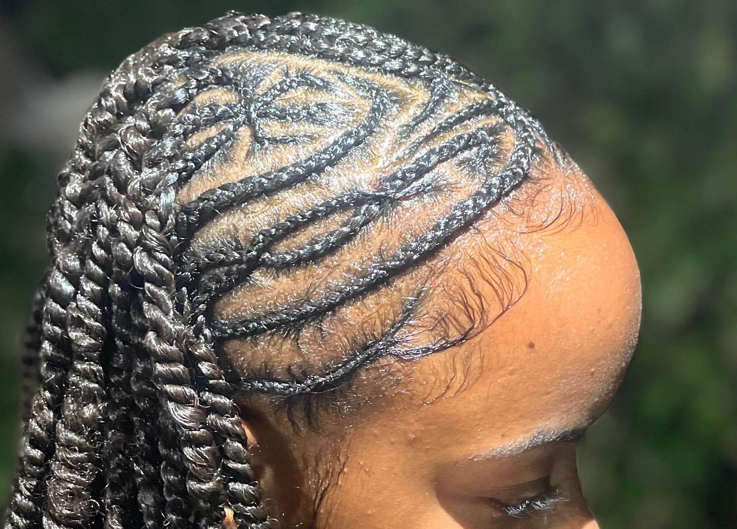 Close-up of intricate braided hairstyle at Kyng’s Hair Care, Saint John's, Saint John, AG.