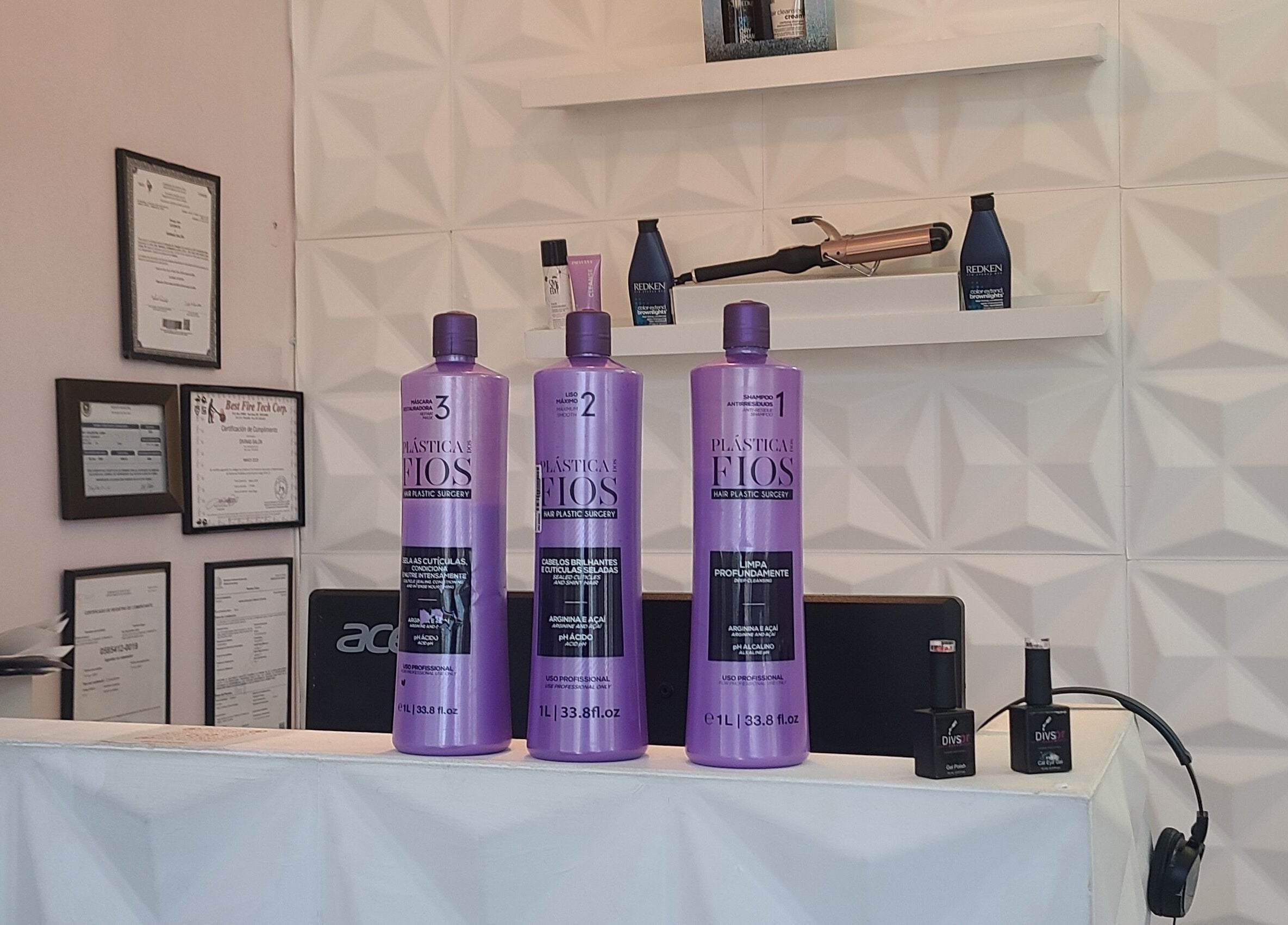 Product display at Divspr Professional Care, San Juan showcasing hair care items and certifications.