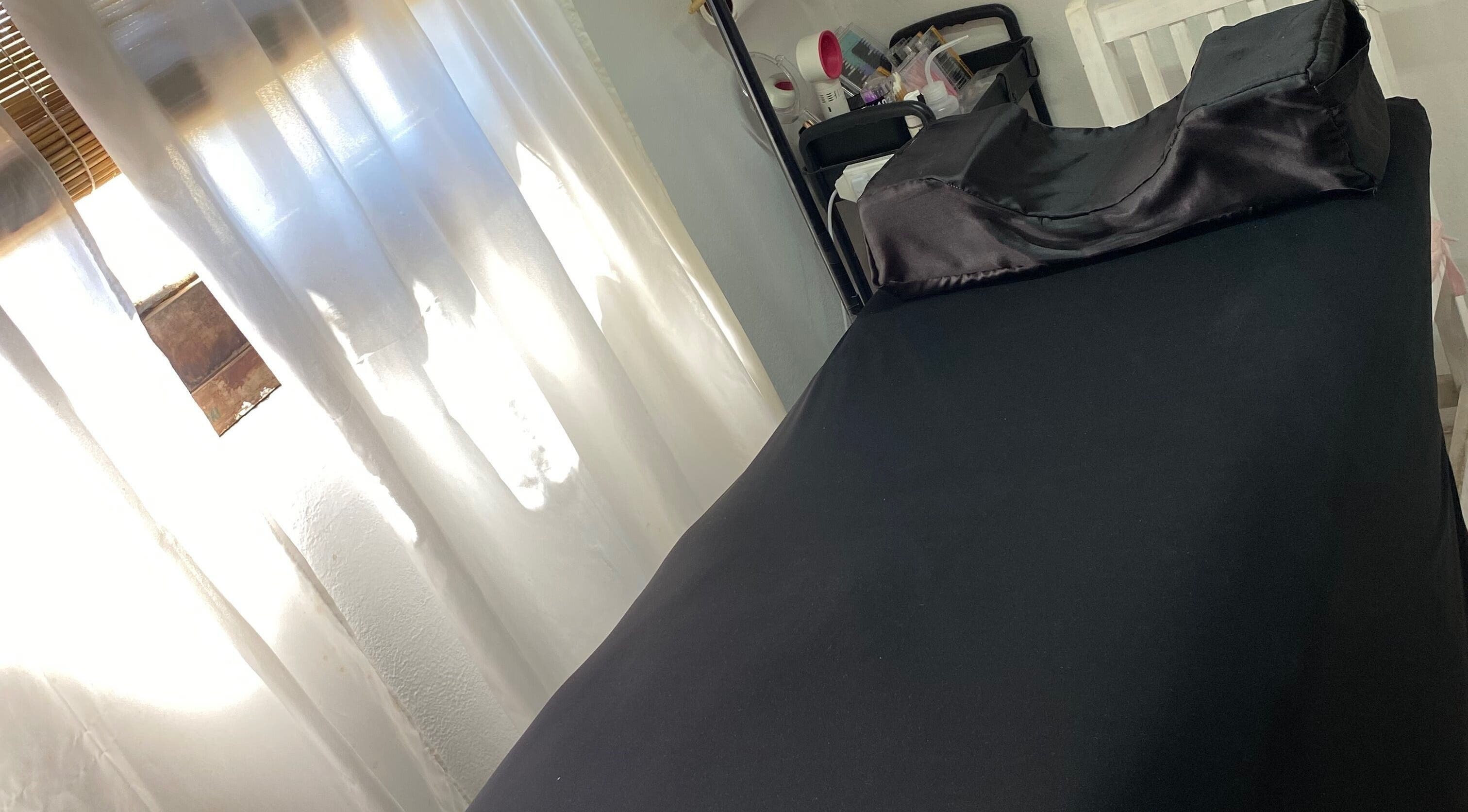 Massage bed at Aura, Gualeguaychú, Entre Ríos, AR bathed in soft natural light.