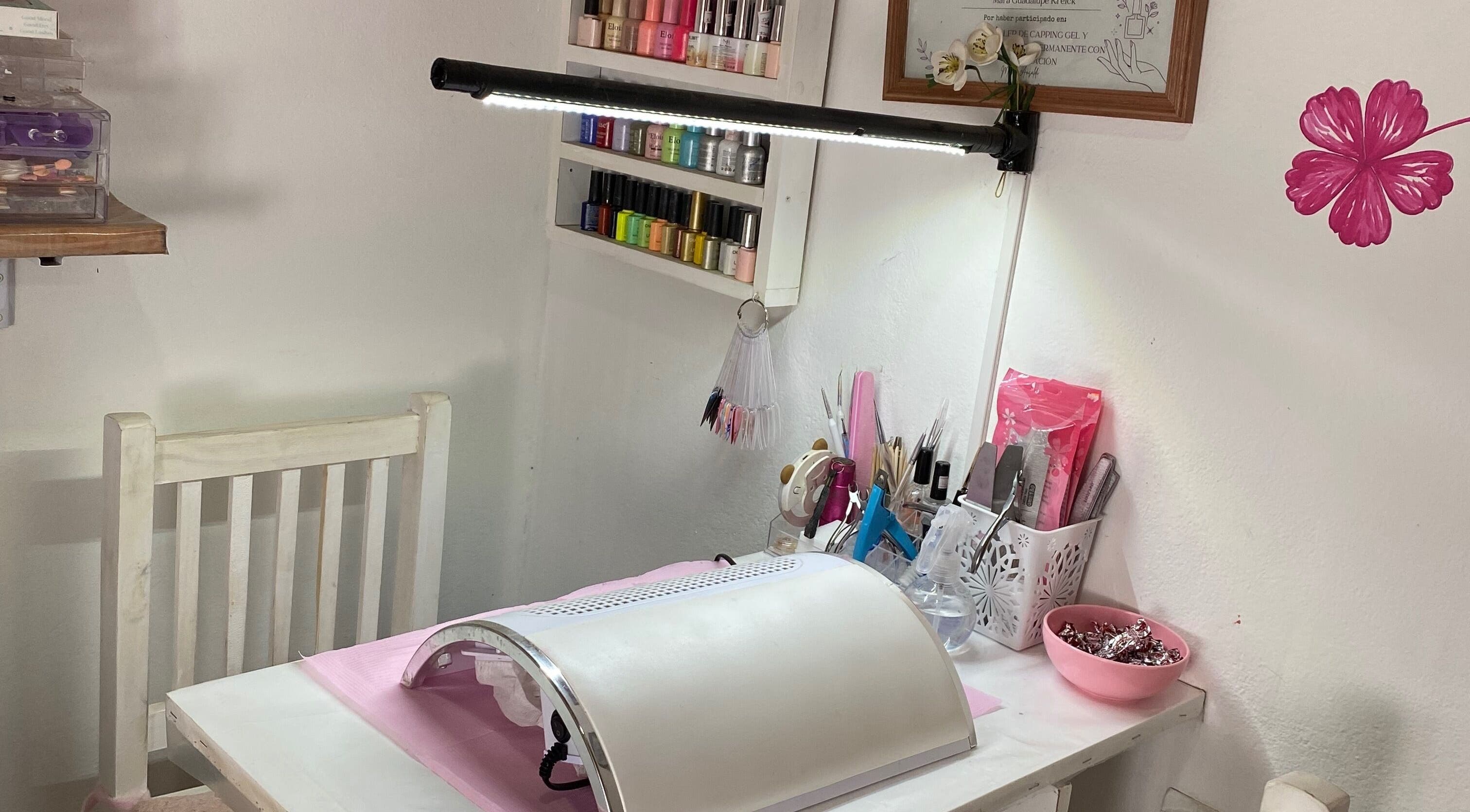 Nail care station at Aura in Gualeguaychú, Entre Ríos, AR with tools and nail polishes.