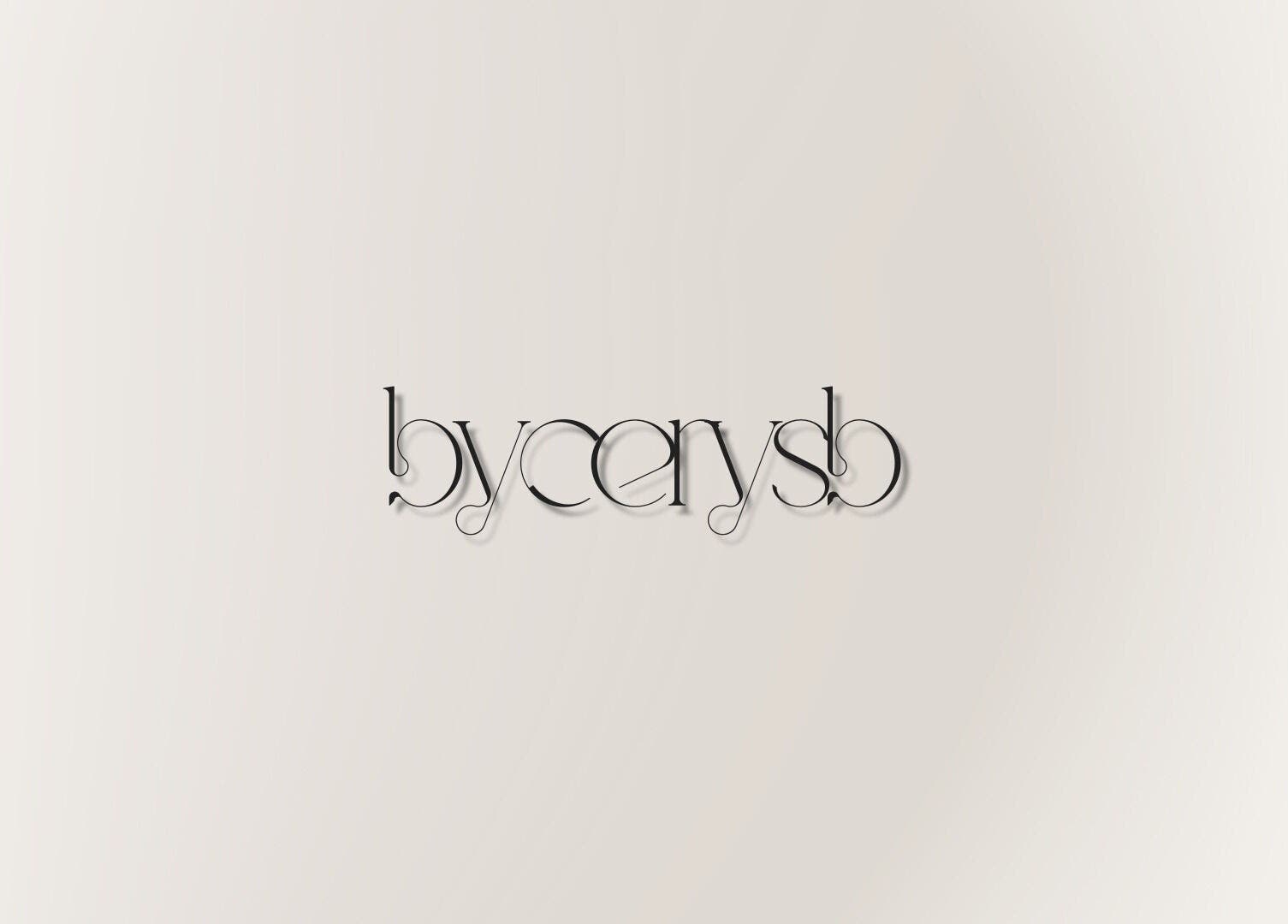 Elegant ByCerysB logo against a neutral backdrop in Cambridge, England, GB.