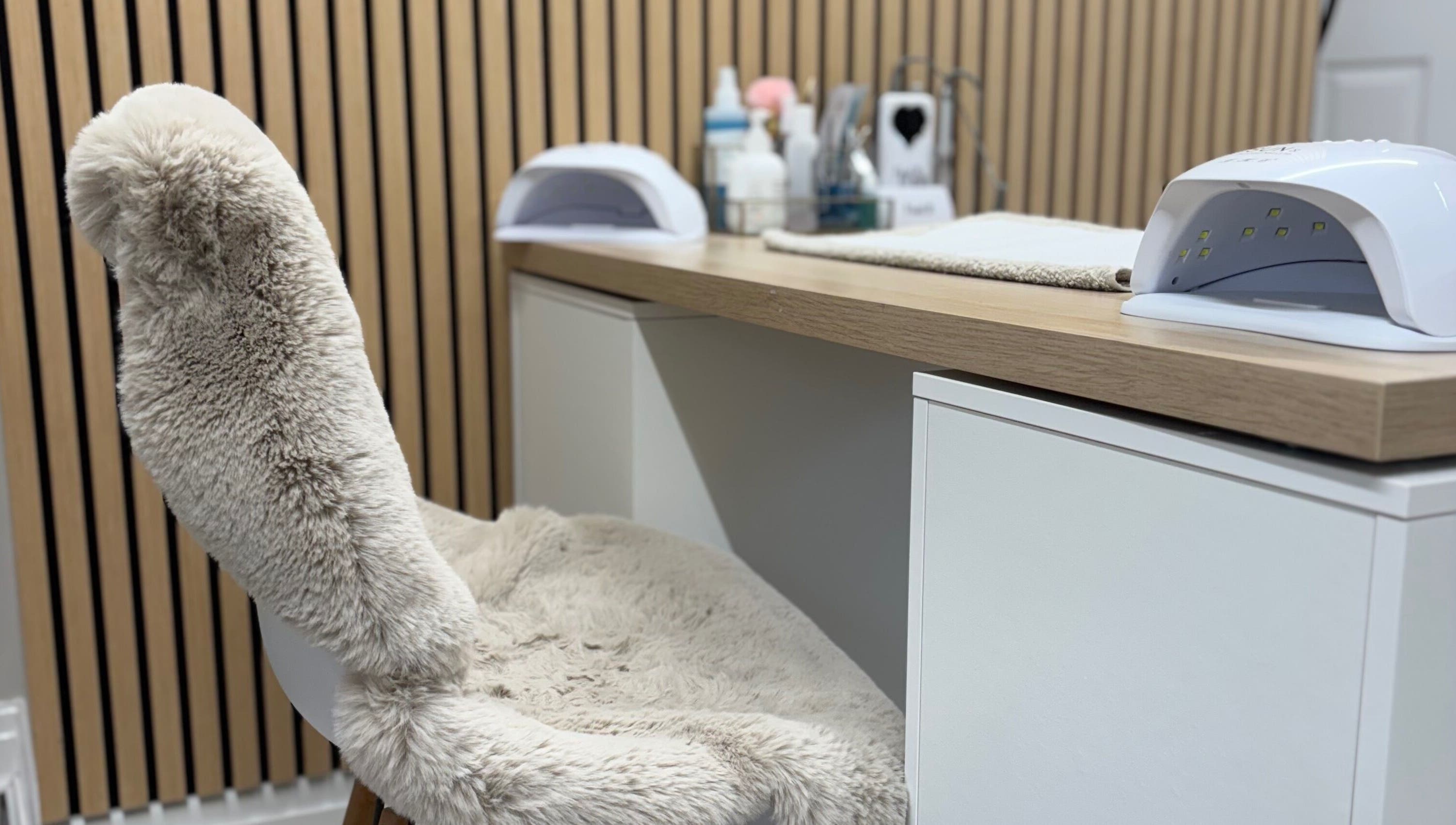 Fluffy chair and nail station at Kls Beauty, Marple, England, GB. Perfect for relaxing manicures.