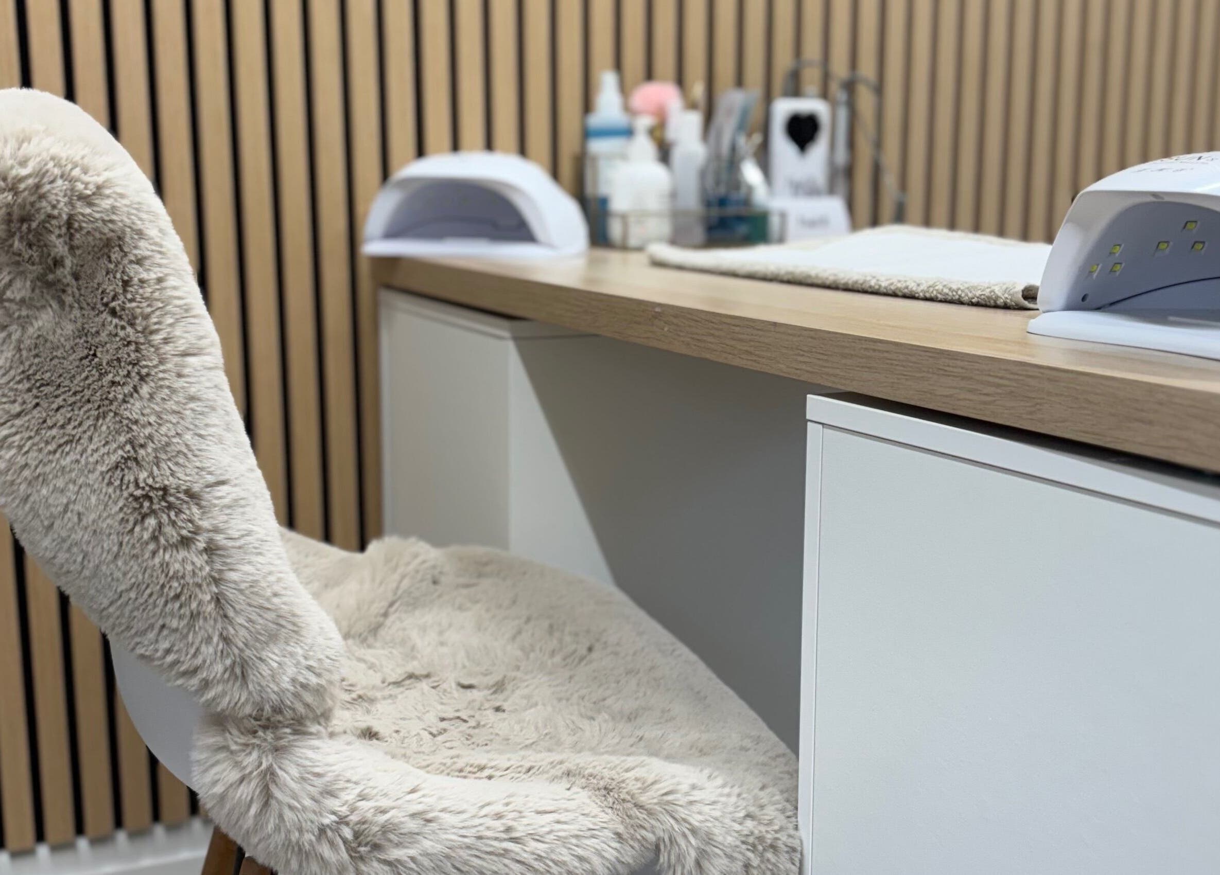 Fluffy chair and nail station at Kls Beauty, Marple, England, GB. Perfect for relaxing manicures.