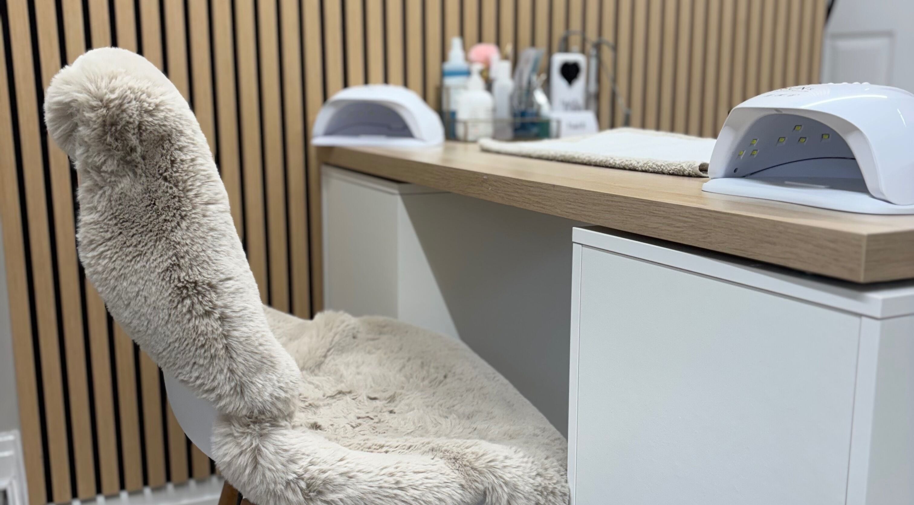 Fluffy chair and nail station at Kls Beauty, Marple, England, GB. Perfect for relaxing manicures.
