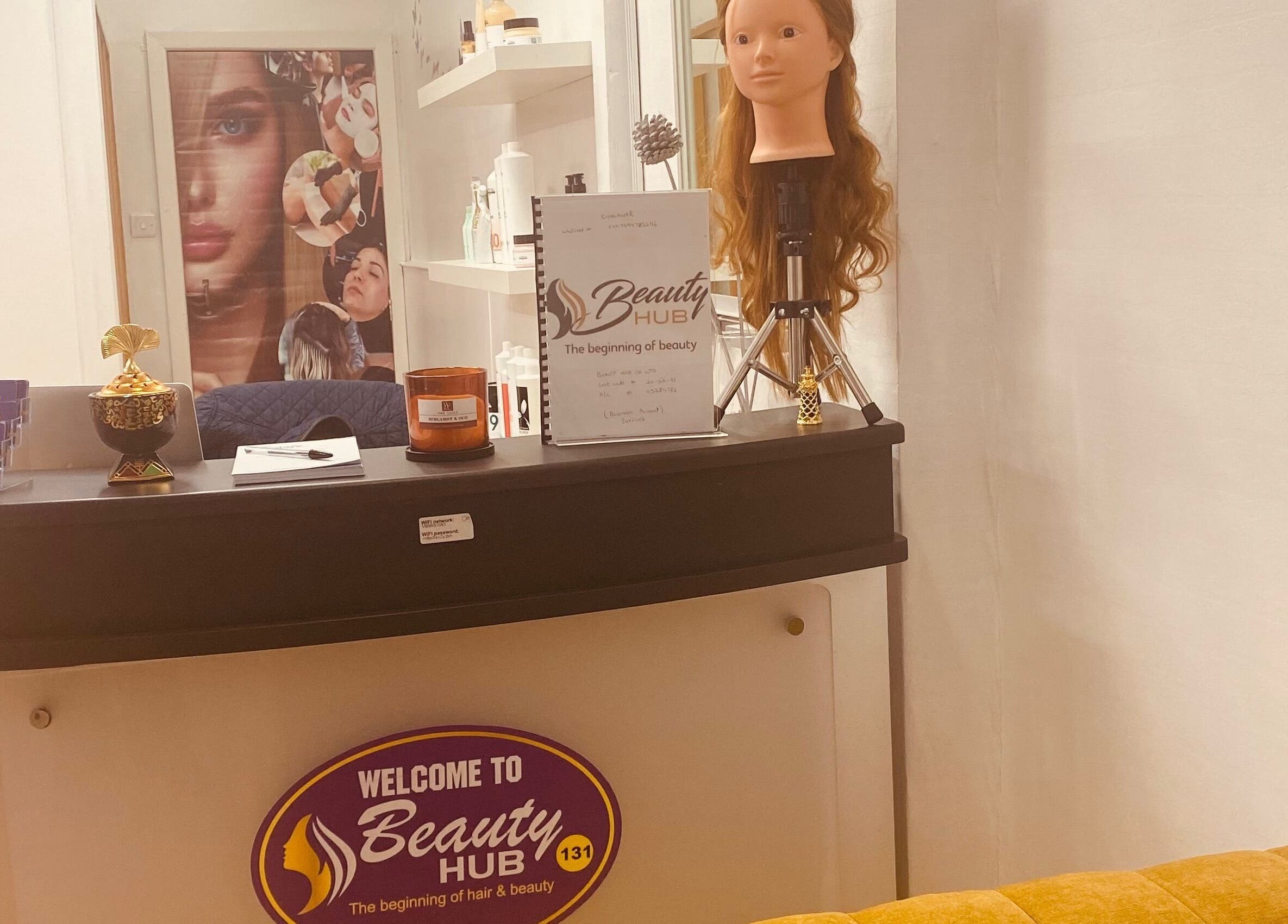 Reception area at Beauty Hub 131, Nelson, England, GB, showcasing welcoming decor and beauty items.