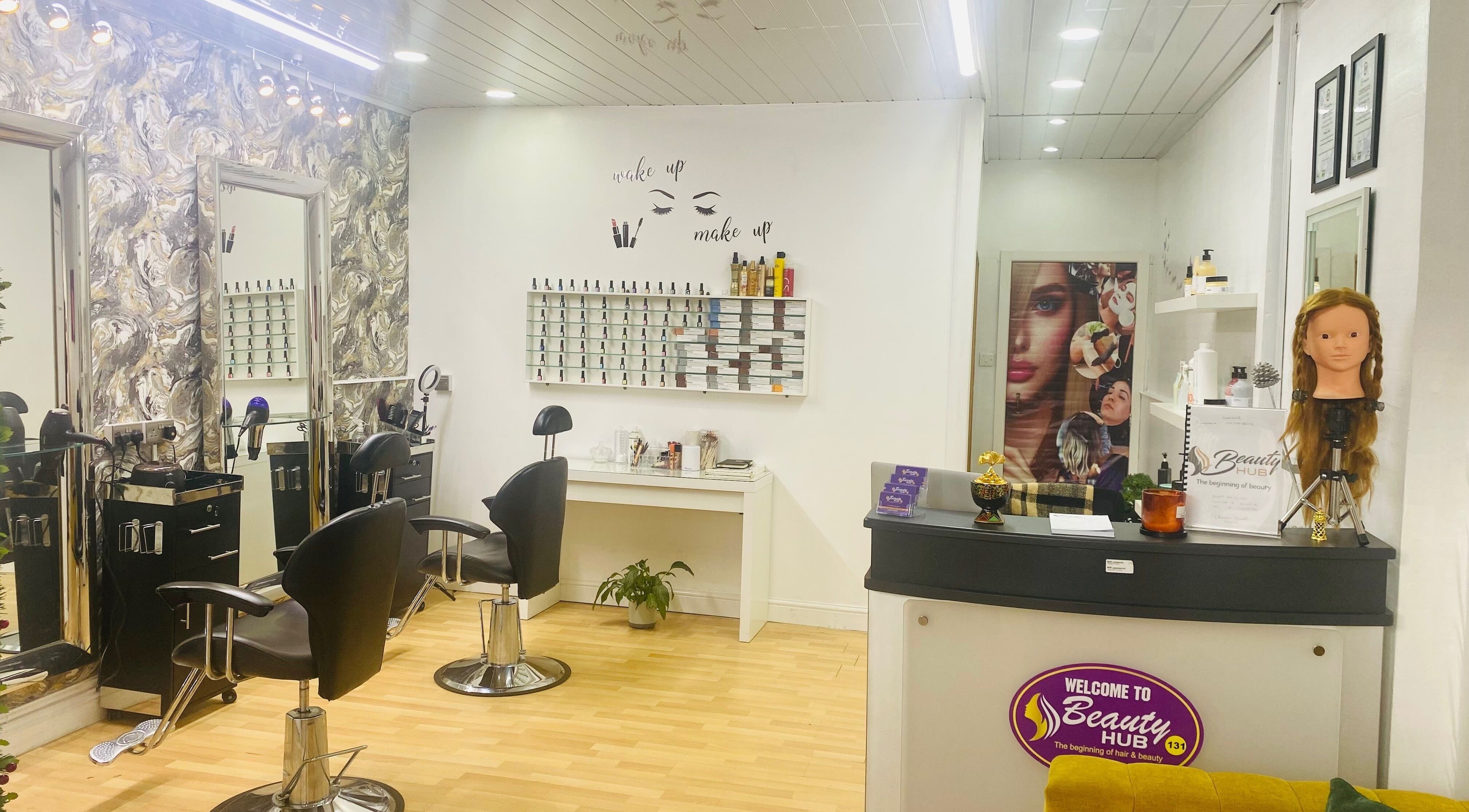 Inside Beauty Hub 131 salon in Nelson, England, GB featuring styling chairs and products on display.