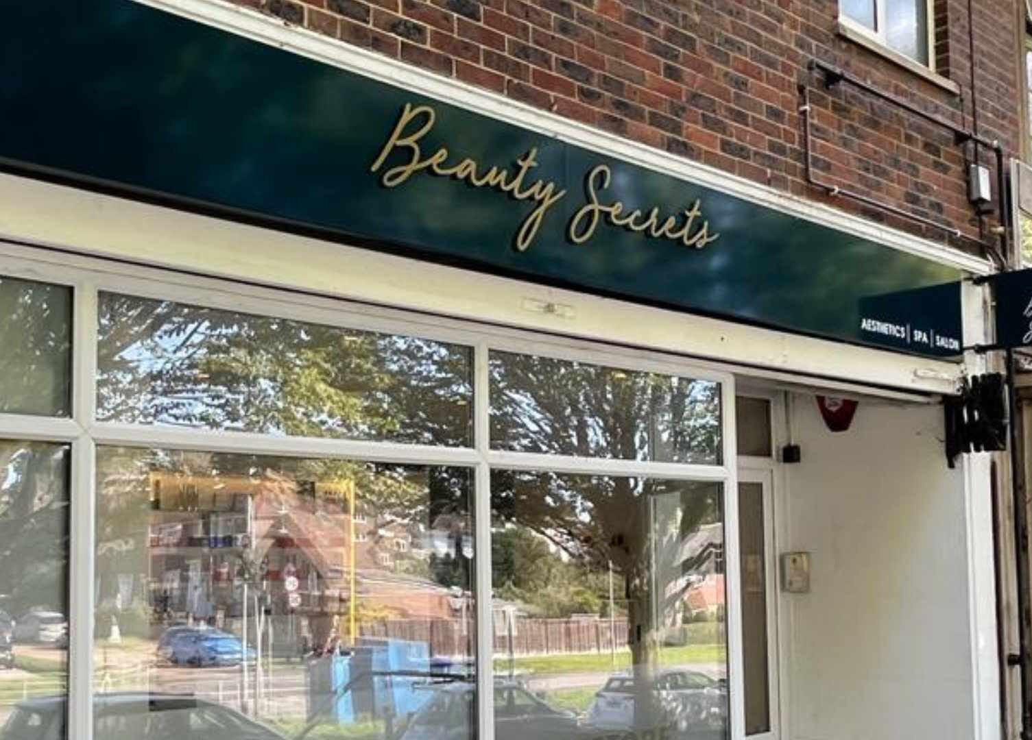 Sarelle Clinic Ltd storefront in Brighton And Hove, England, GB with elegant Beauty Secrets signage.