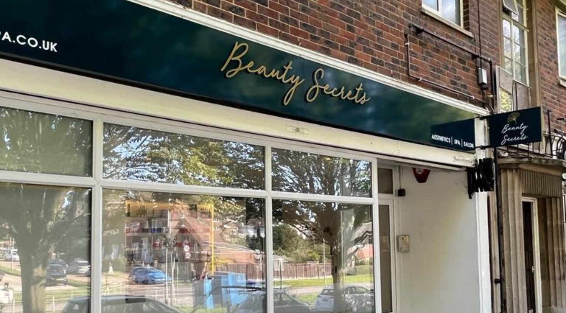 Sarelle Clinic Ltd storefront in Brighton And Hove, England, GB with elegant Beauty Secrets signage.