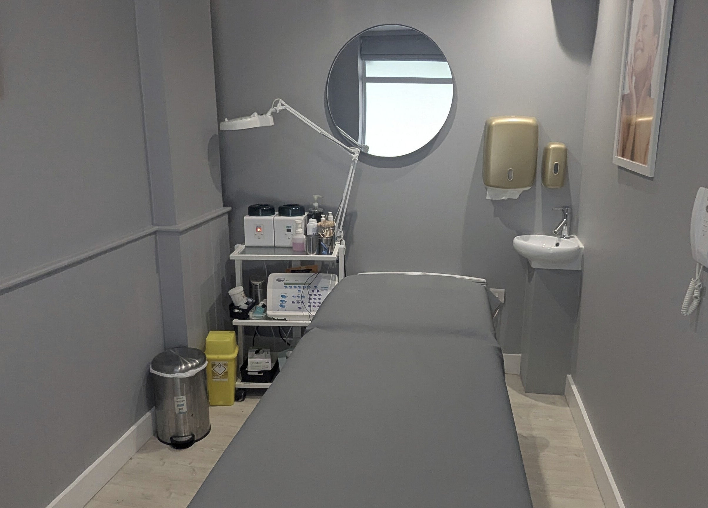 Serene treatment room at Sarelle Clinic Ltd, Brighton And Hove, England, GB, featuring modern amenities.