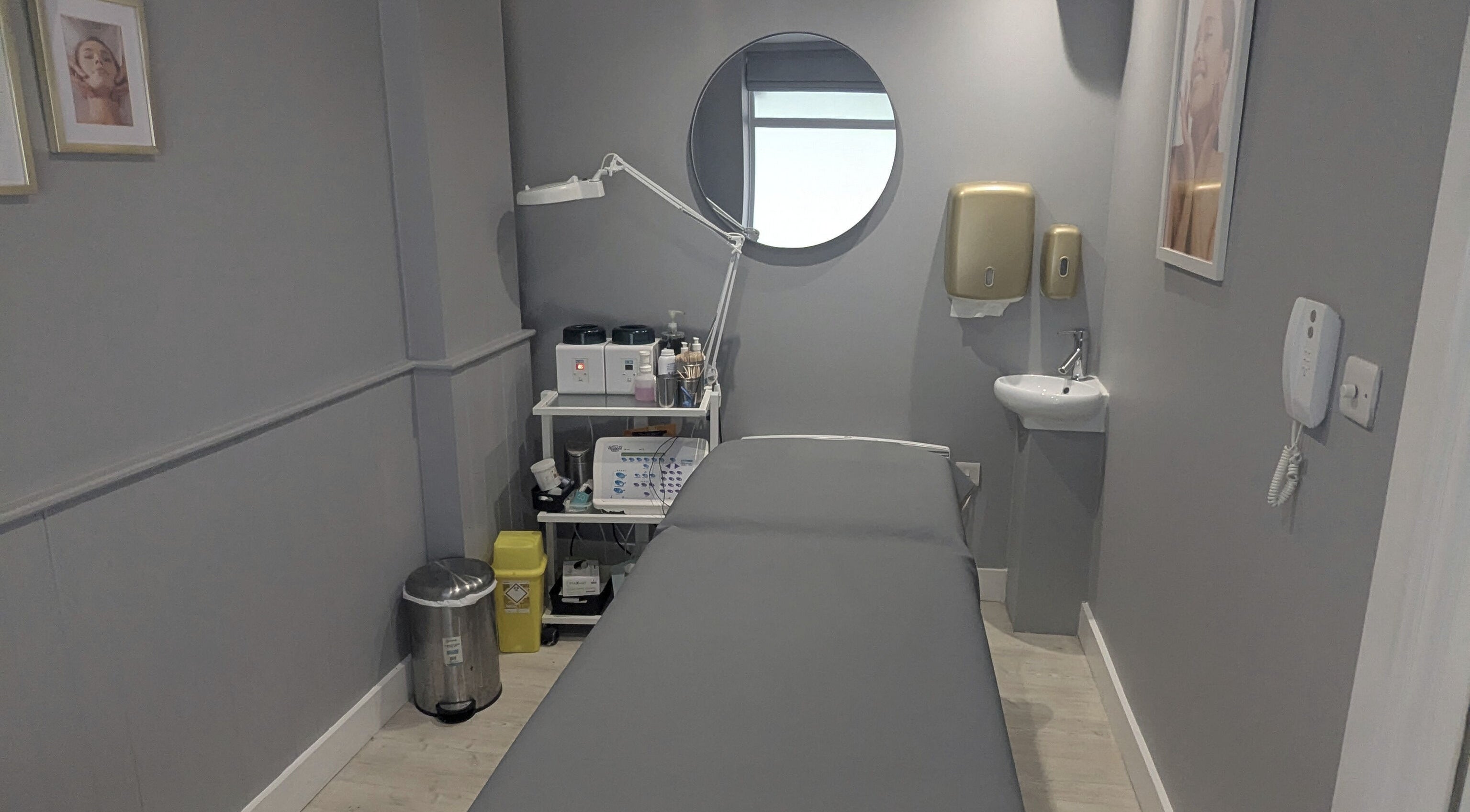 Serene treatment room at Sarelle Clinic Ltd, Brighton And Hove, England, GB, featuring modern amenities.