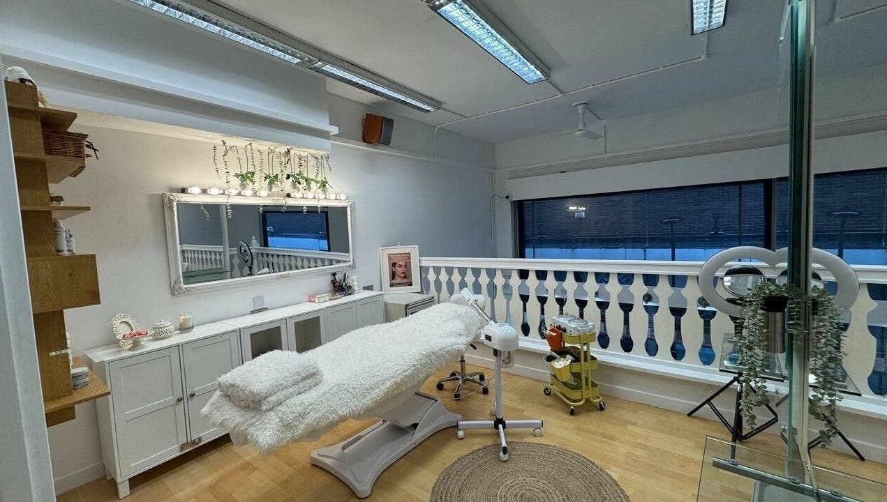 Luxurious therapy room at Glam S Beauty, Bolton, England, GB, featuring plush treatment table and elegant decor.