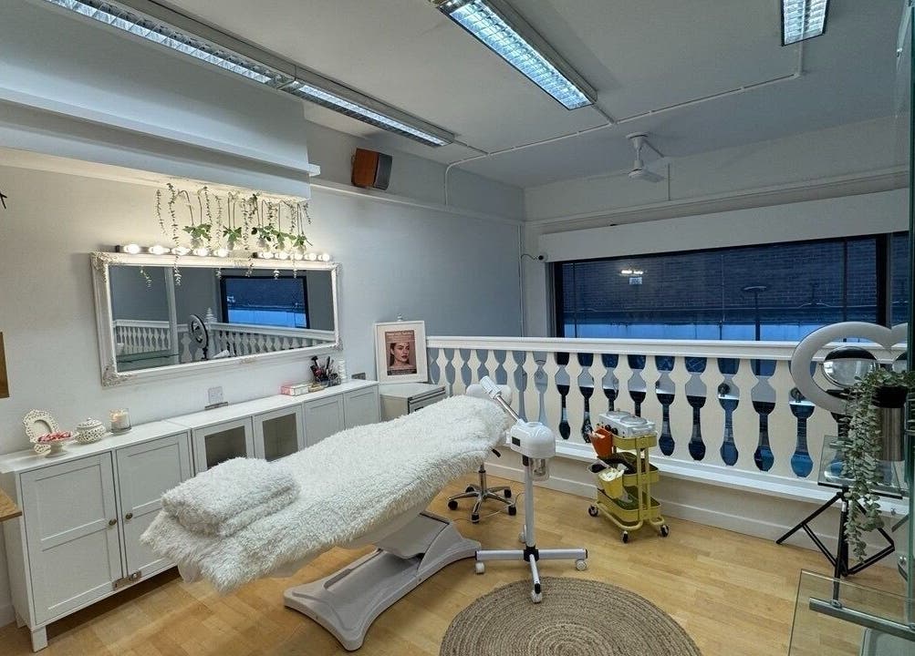 Luxurious therapy room at Glam S Beauty, Bolton, England, GB, featuring plush treatment table and elegant decor.
