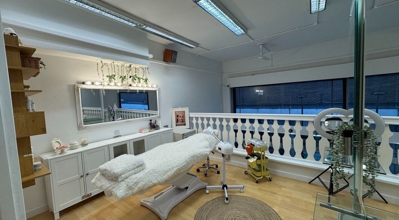 Luxurious therapy room at Glam S Beauty, Bolton, England, GB, featuring plush treatment table and elegant decor.