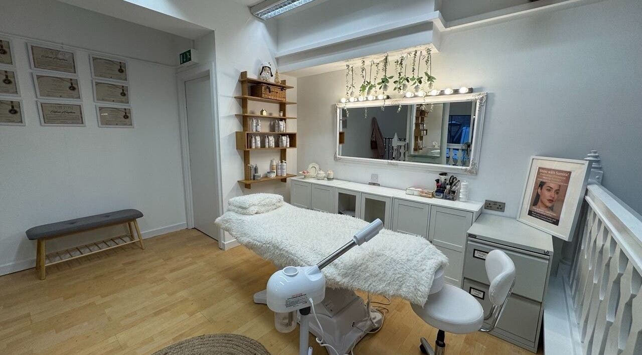 Relaxing treatment room at Glam S Beauty in Bolton, England, GB with cozy bed and elegant decor.