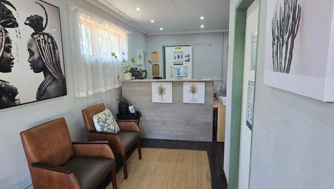 Inviting waiting area at Gerhard Shaw Physiotherapy, Pretoria, Gauteng, ZA with art and comfortable seating.