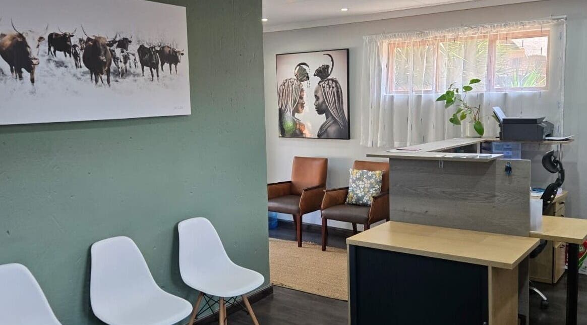 Cozy waiting area with art at Gerhard Shaw Physiotherapy, Pretoria, Gauteng, ZA.