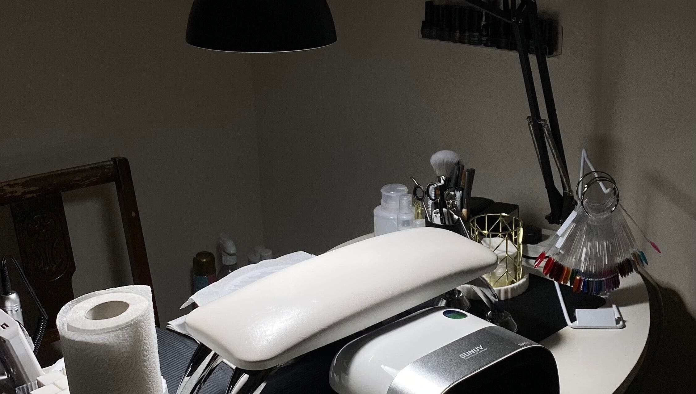 Mayasnailstudiox nail station in Llay, Wales, GB, featuring tools and manicure essentials in a cozy setting.