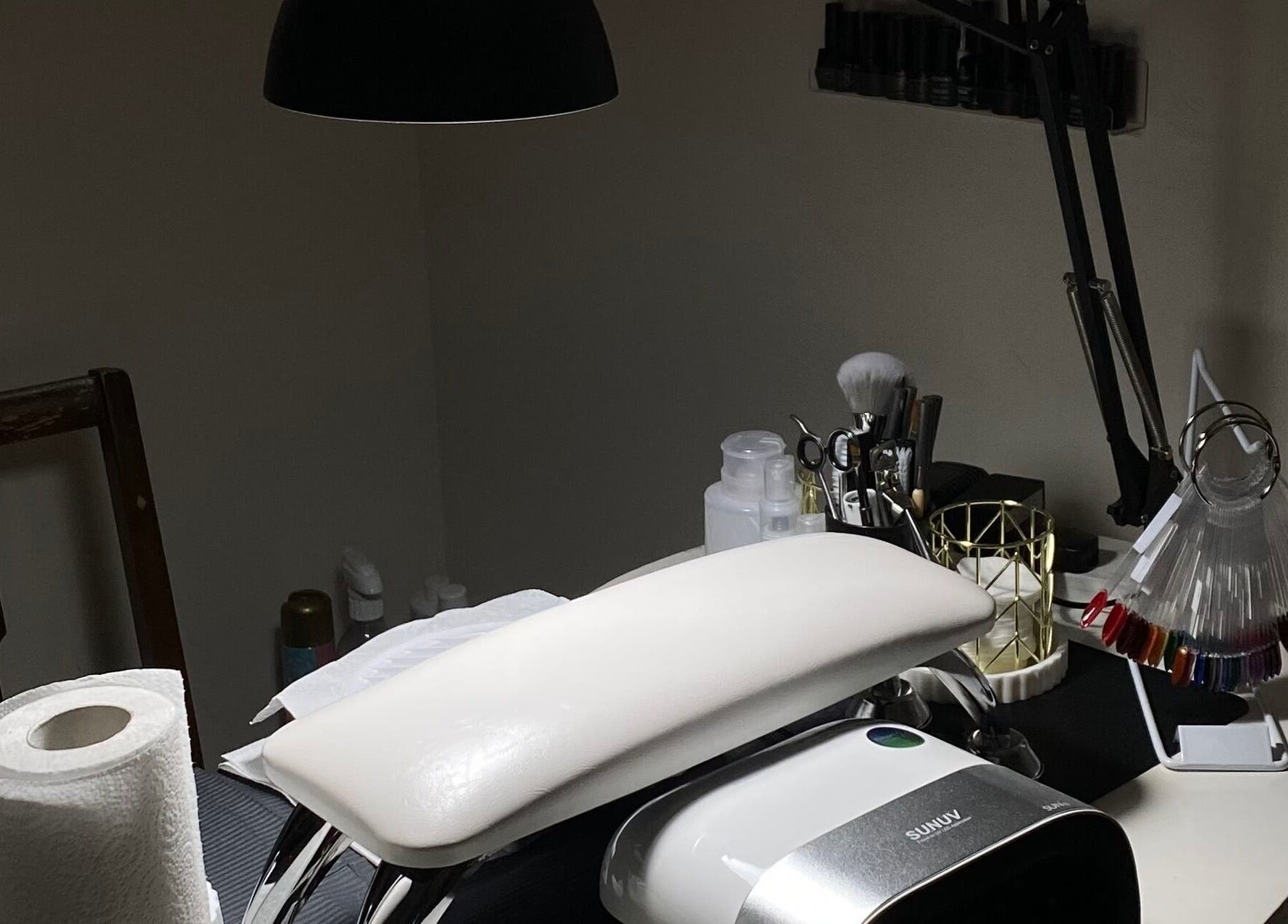 Mayasnailstudiox nail station in Llay, Wales, GB, featuring tools and manicure essentials in a cozy setting.