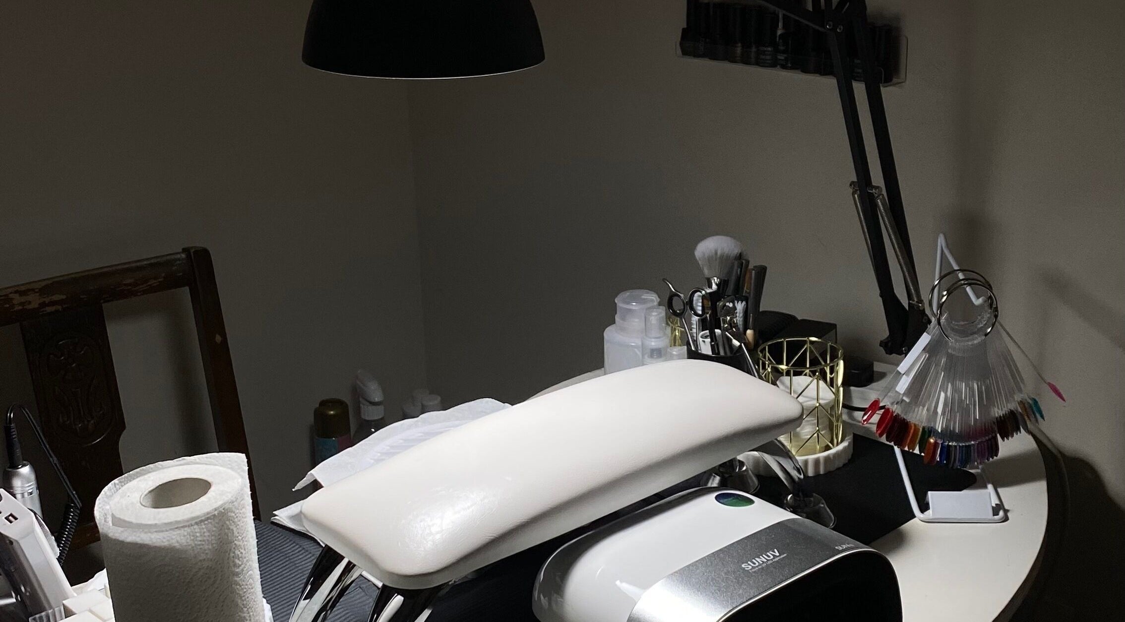 Mayasnailstudiox nail station in Llay, Wales, GB, featuring tools and manicure essentials in a cozy setting.