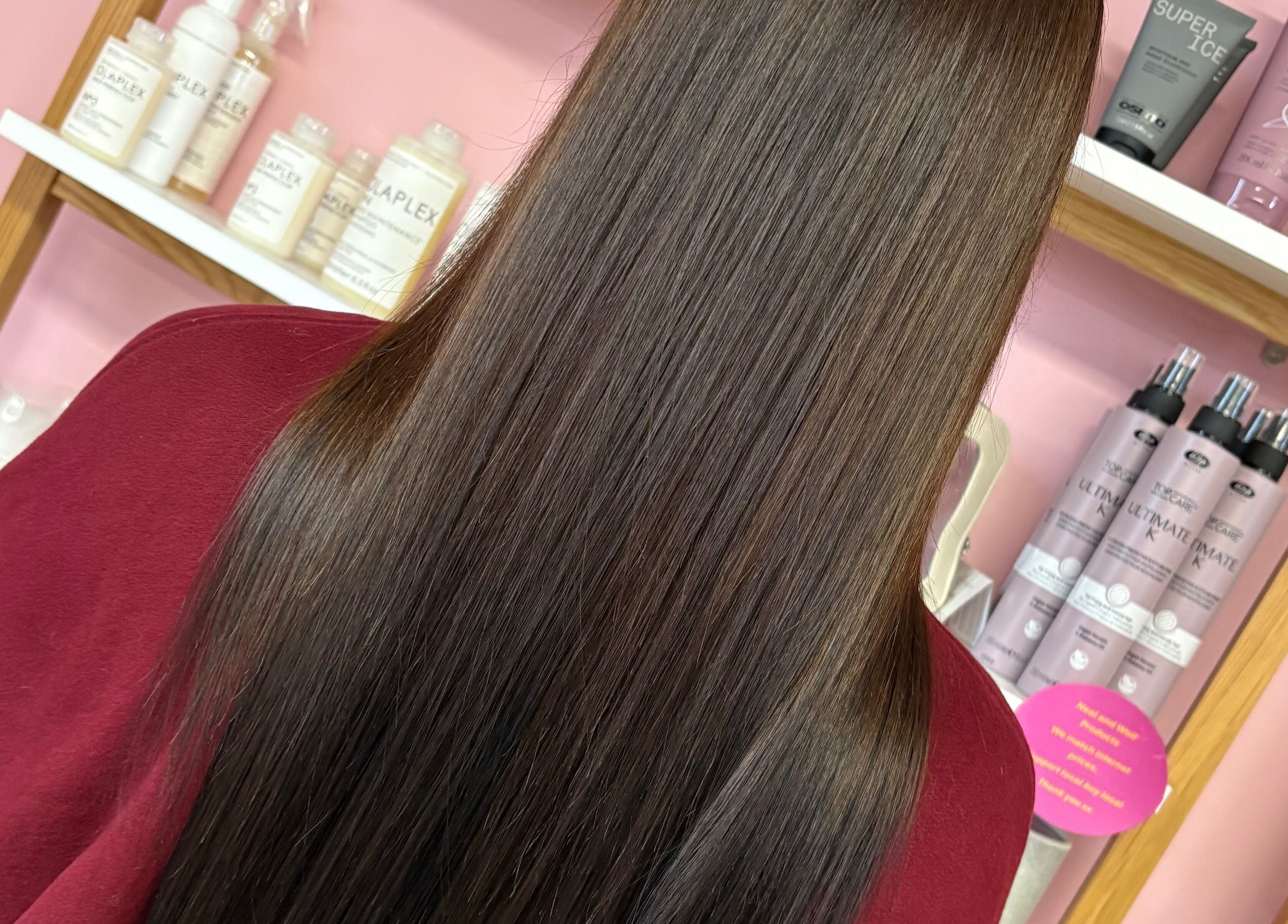Glossy, straightened hair showcased at Beverley @ Akina hair salon, Hull, England, GB.