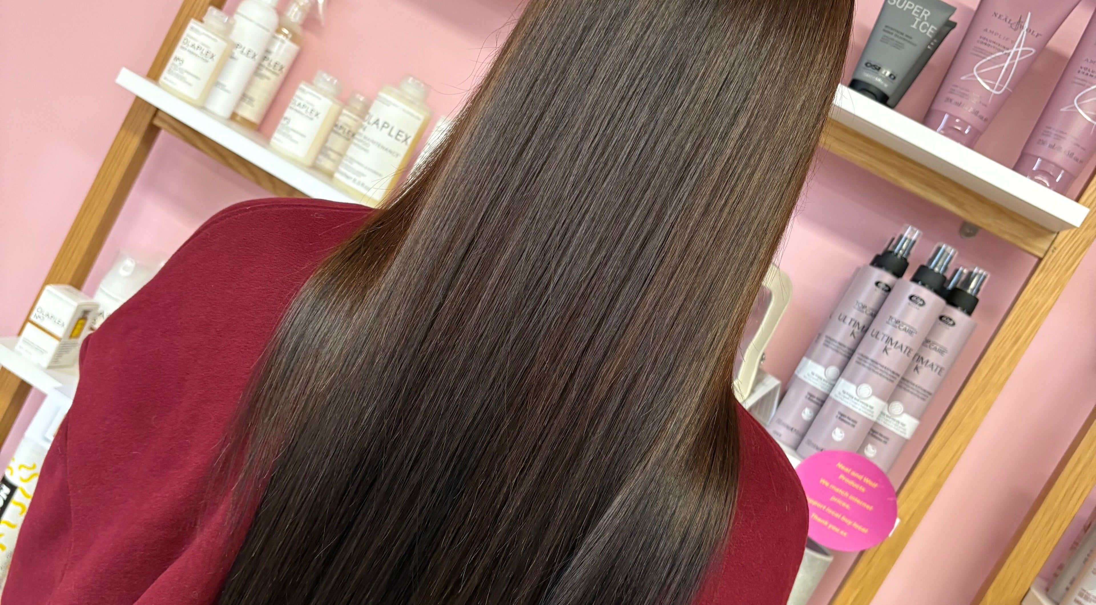 Glossy, straightened hair showcased at Beverley @ Akina hair salon, Hull, England, GB.