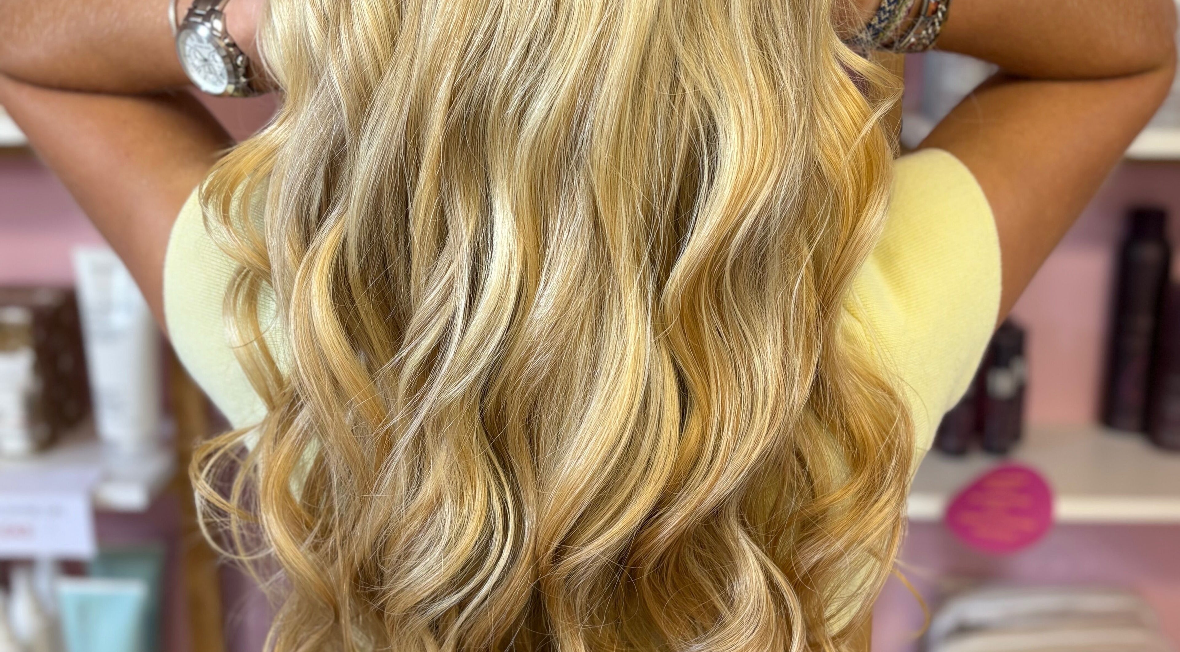 Blonde wavy hair styled at Beverley @ Akina hair salon, Hull, England, GB showcases vibrant elegance and shine.