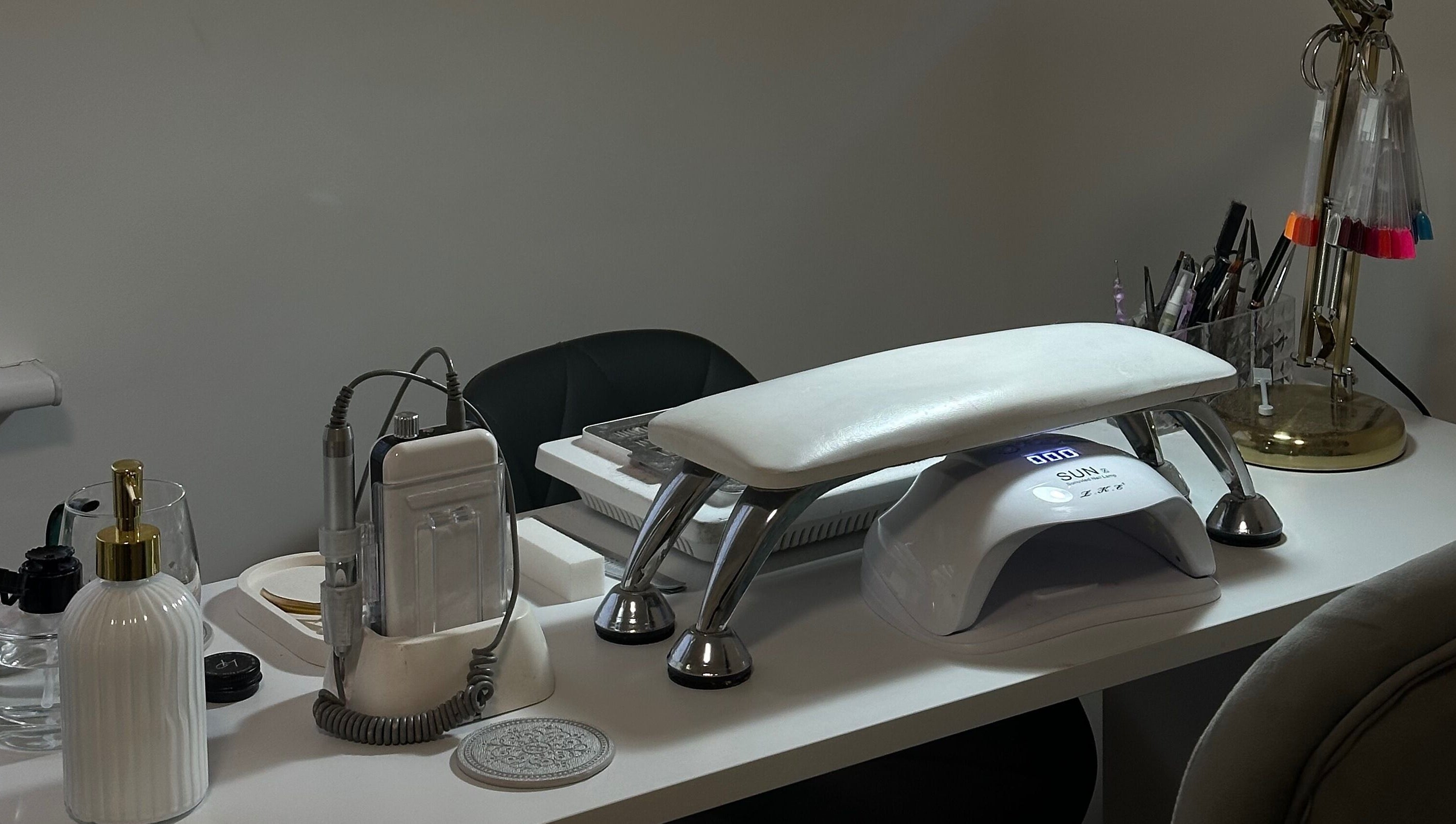 Modern nail station at The Nail Haven, Nottingham, England, GB showcasing advanced manicure tools.
