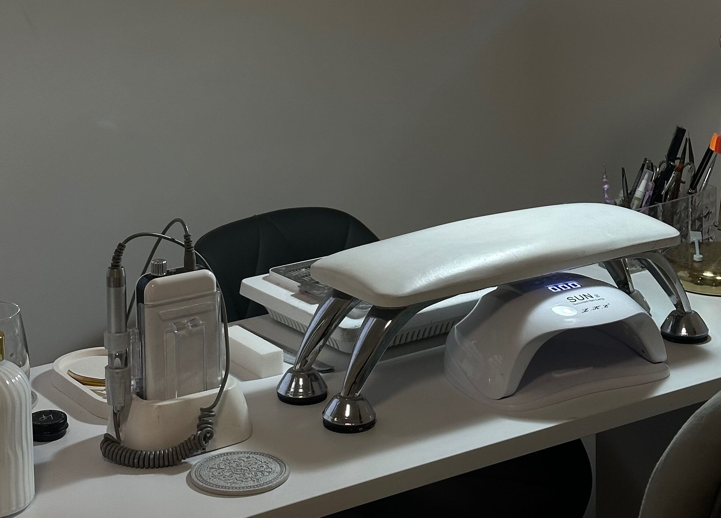 Modern nail station at The Nail Haven, Nottingham, England, GB showcasing advanced manicure tools.