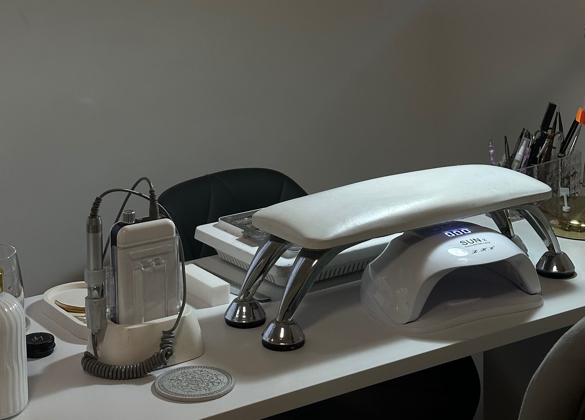Modern nail station at The Nail Haven, Nottingham, England, GB showcasing advanced manicure tools.