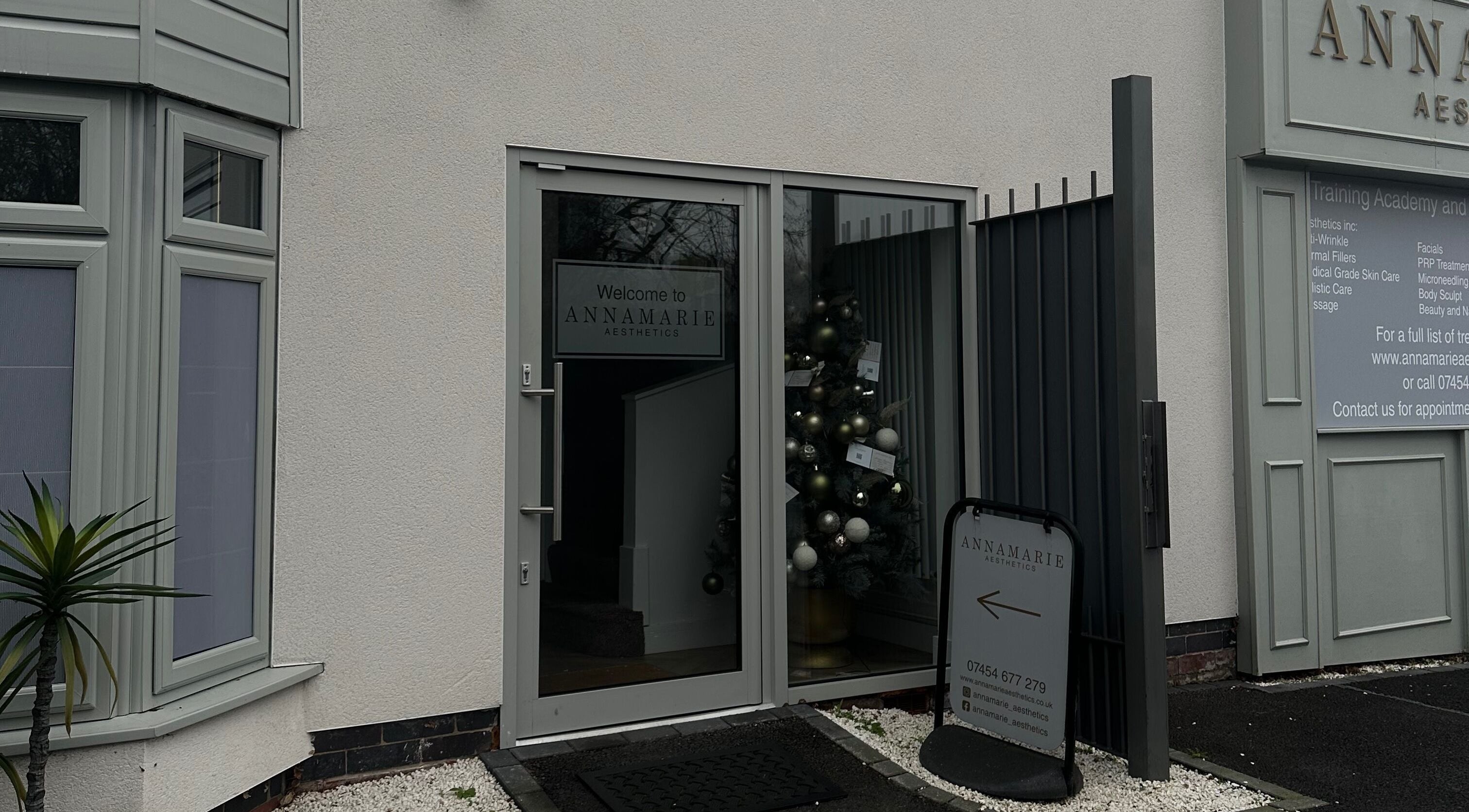 The Nail Haven's sleek entrance door in Nottingham, England, GB with a stylish sign and modern facade.