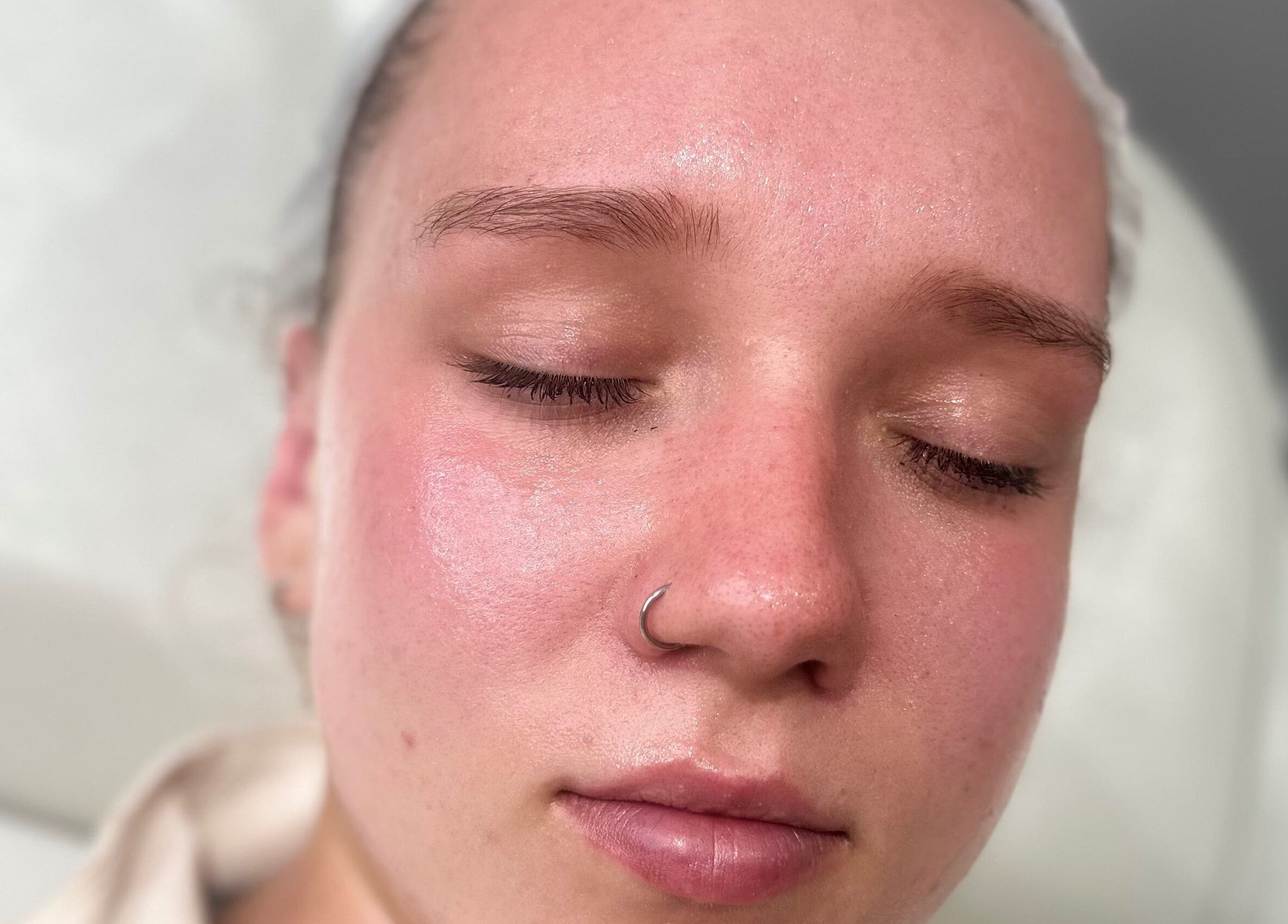 Relaxed client enjoying facial treatment at Pure Radiance by Shauna, Crook, England, GB.