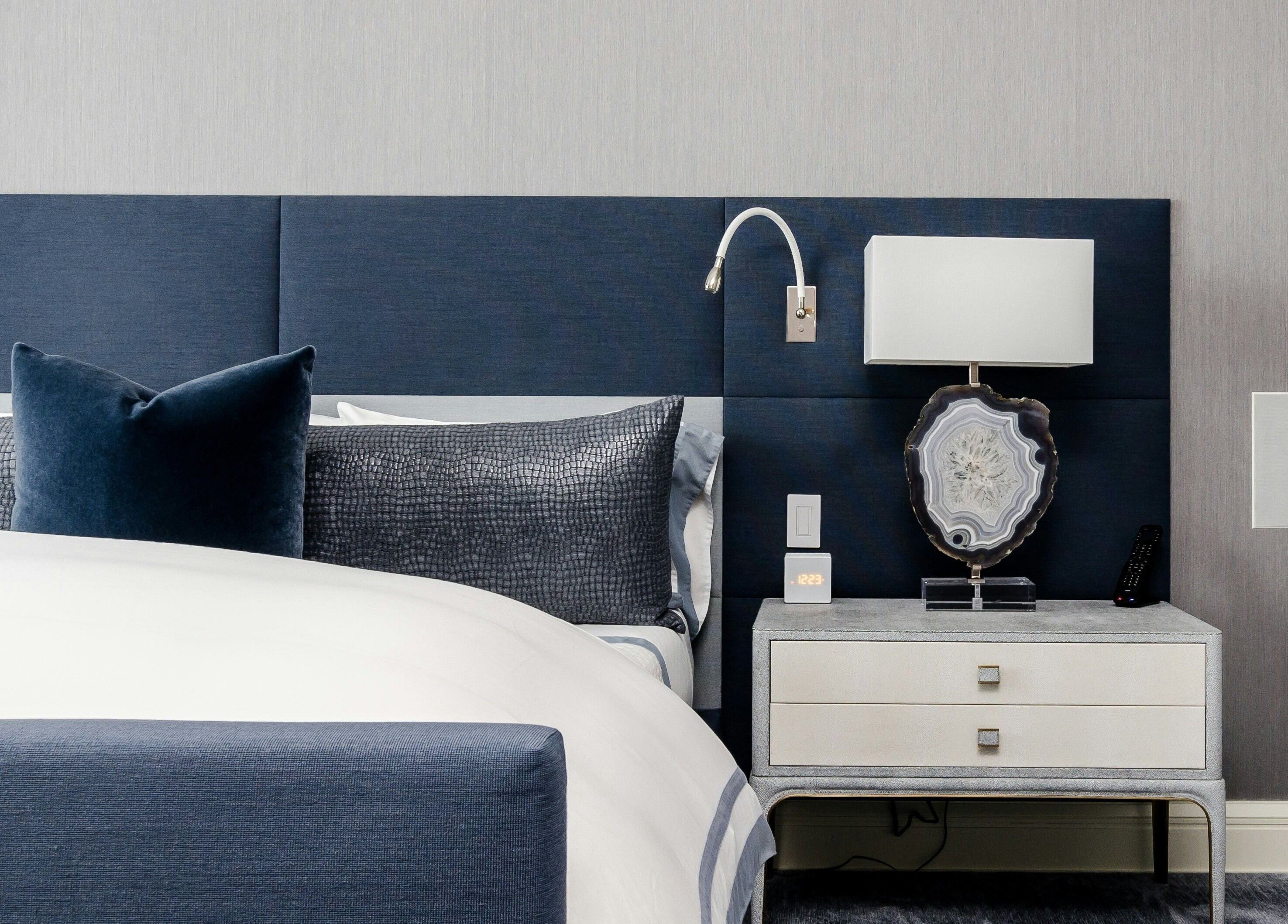 Elegant bedroom setting at Alex Mobile Massage in London, England, GB, featuring a plush bed and modern decor.