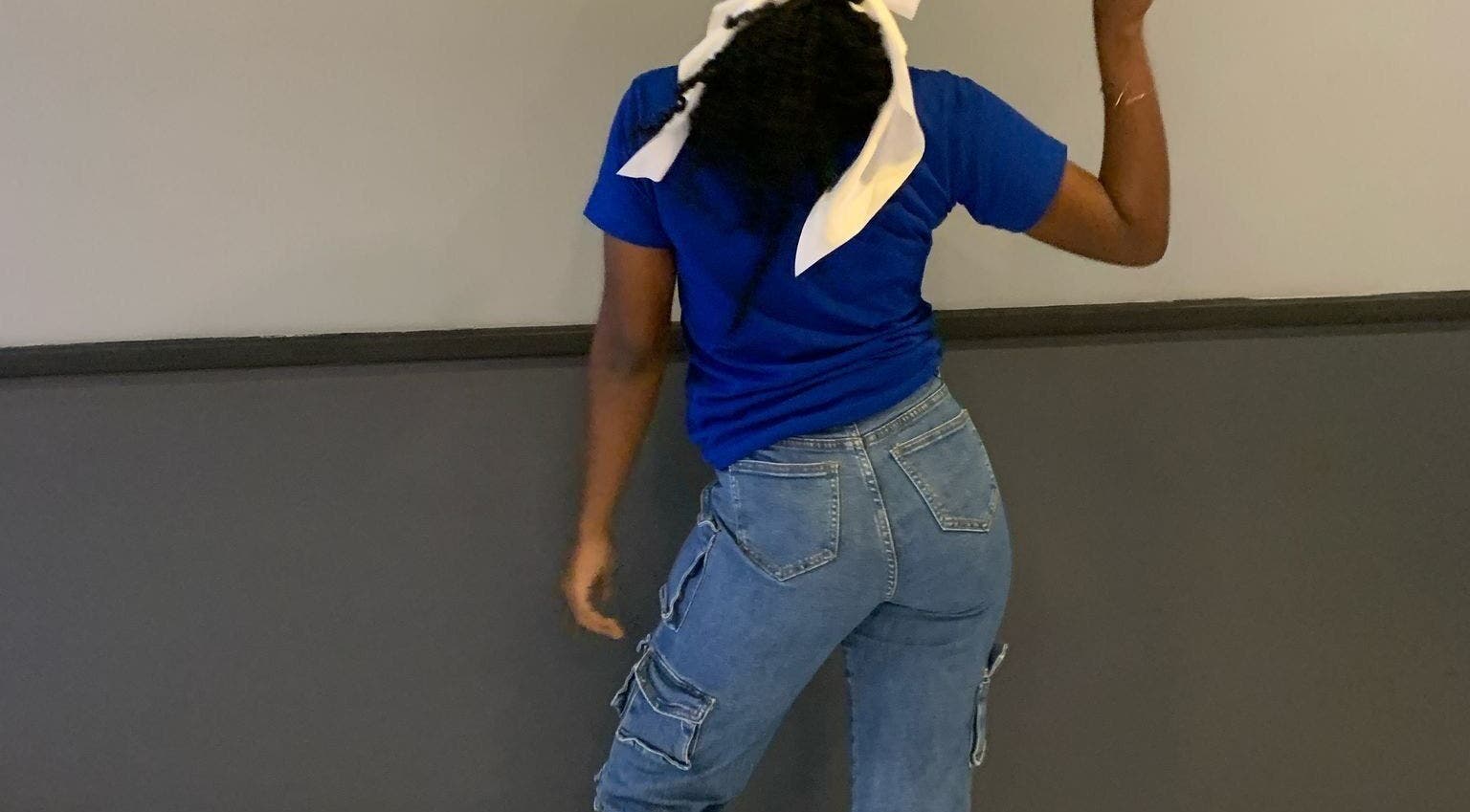 Person in casual jeans and a bandana at donebycharless.bb, Bridgetown, Saint Michael, BB.