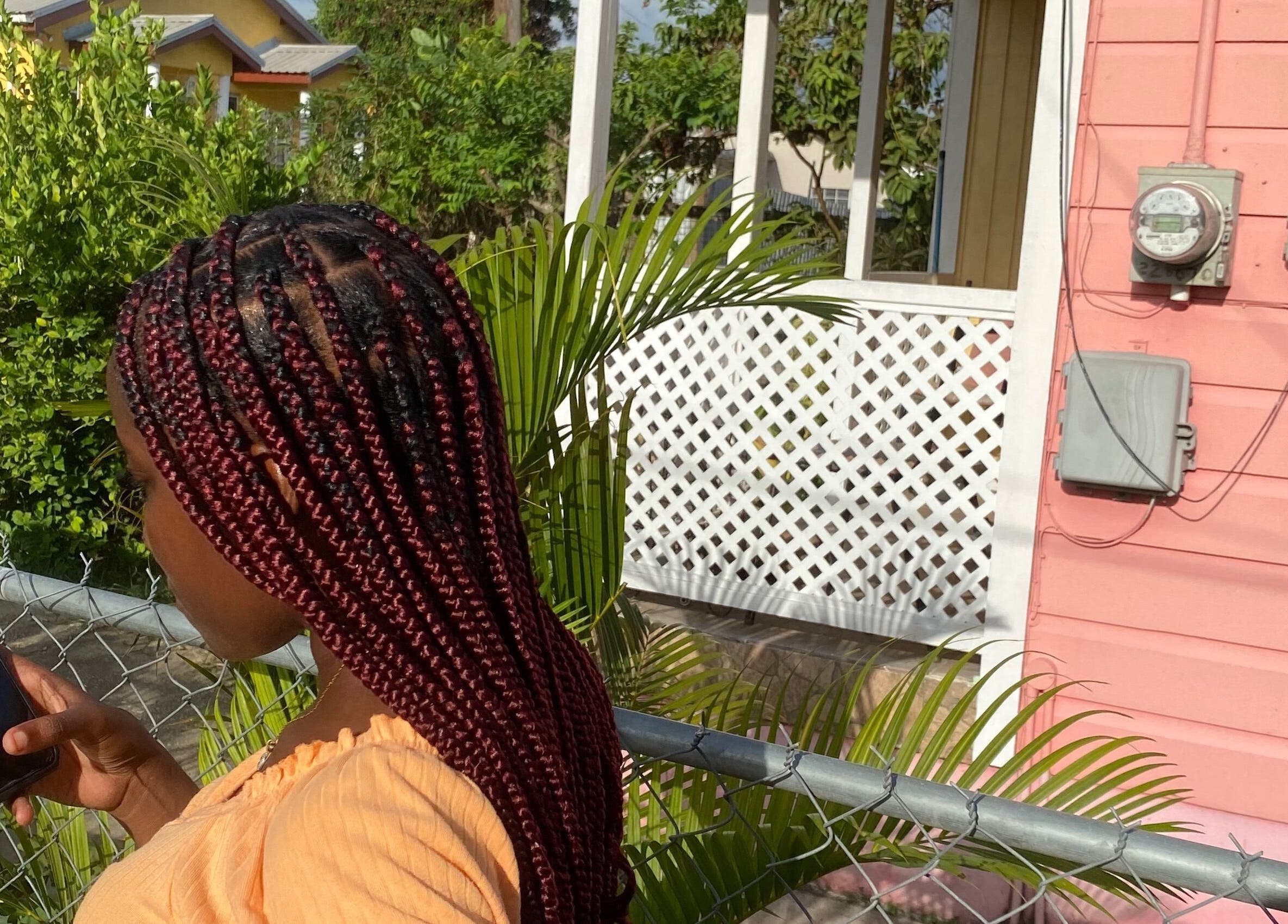 Woman with stylish braids at donebycharless.bb, Bridgetown, Saint Michael, BB.