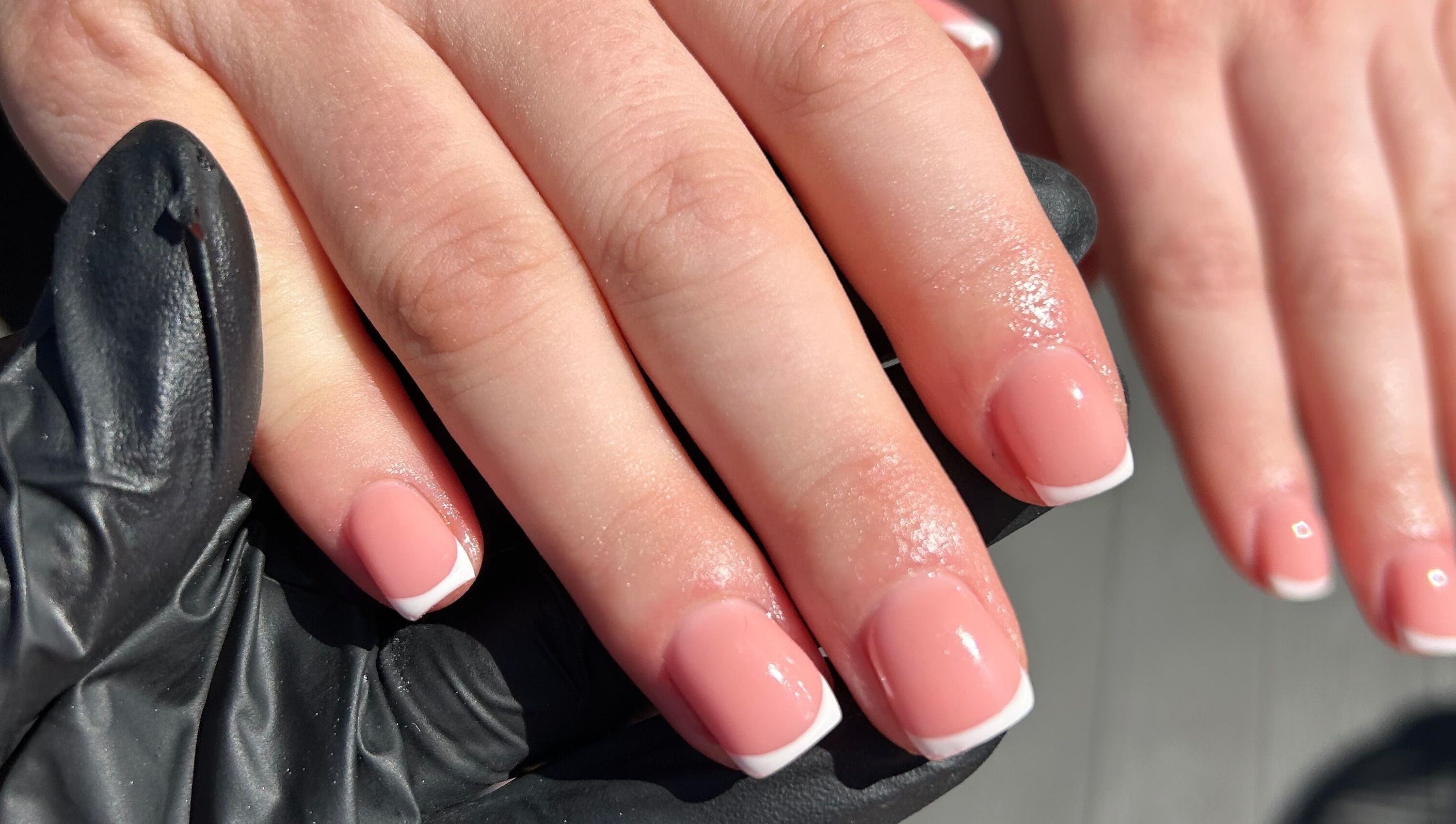 French manicure at By Brooke, Rainham, England, GB, showcasing chic and glossy nails.