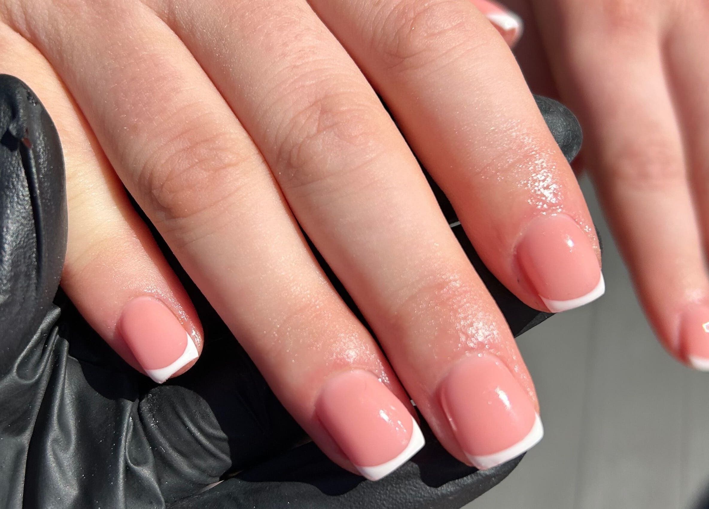 French manicure at By Brooke, Rainham, England, GB, showcasing chic and glossy nails.