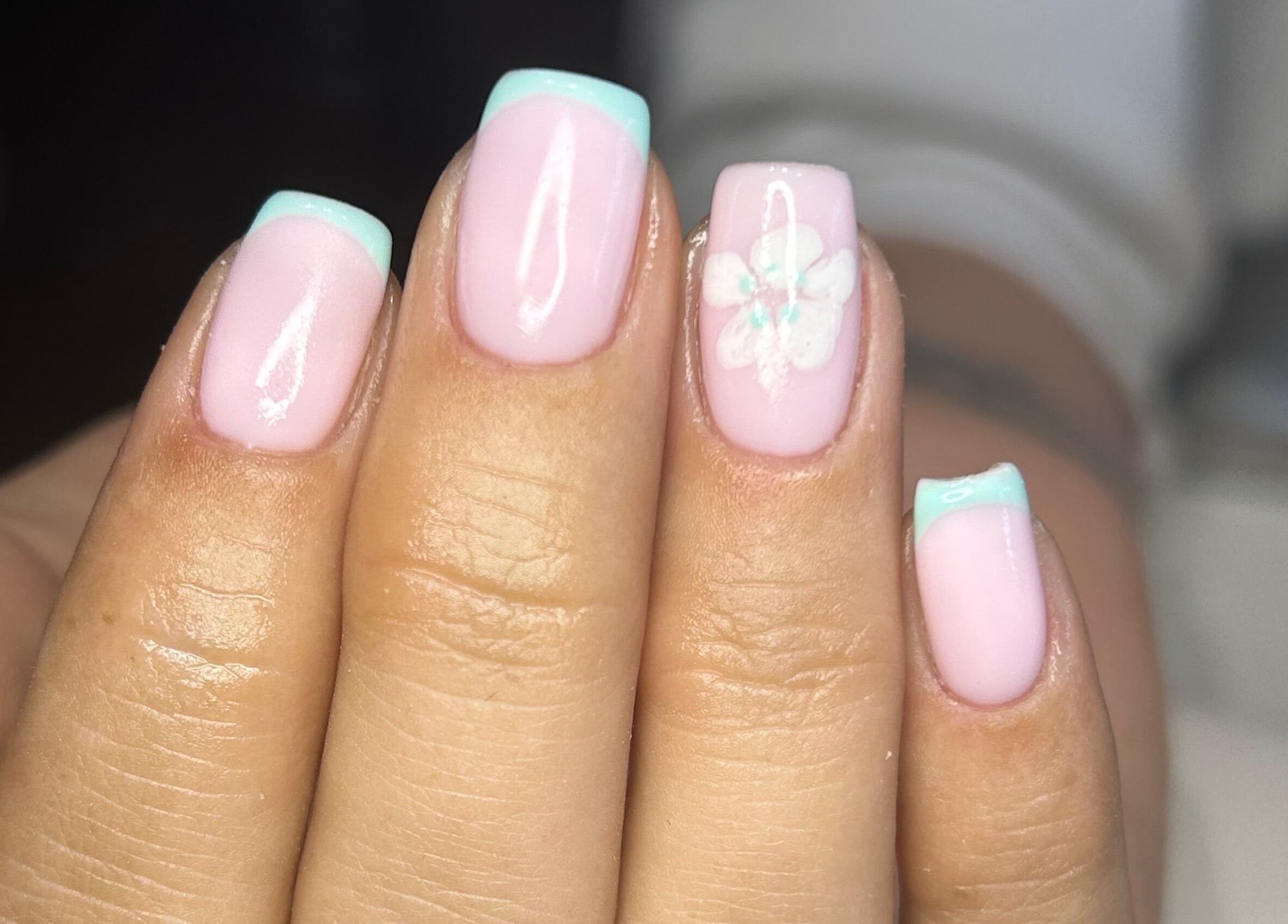 Elegant pastel manicure with floral design at By Brooke, Rainham, England, GB.
