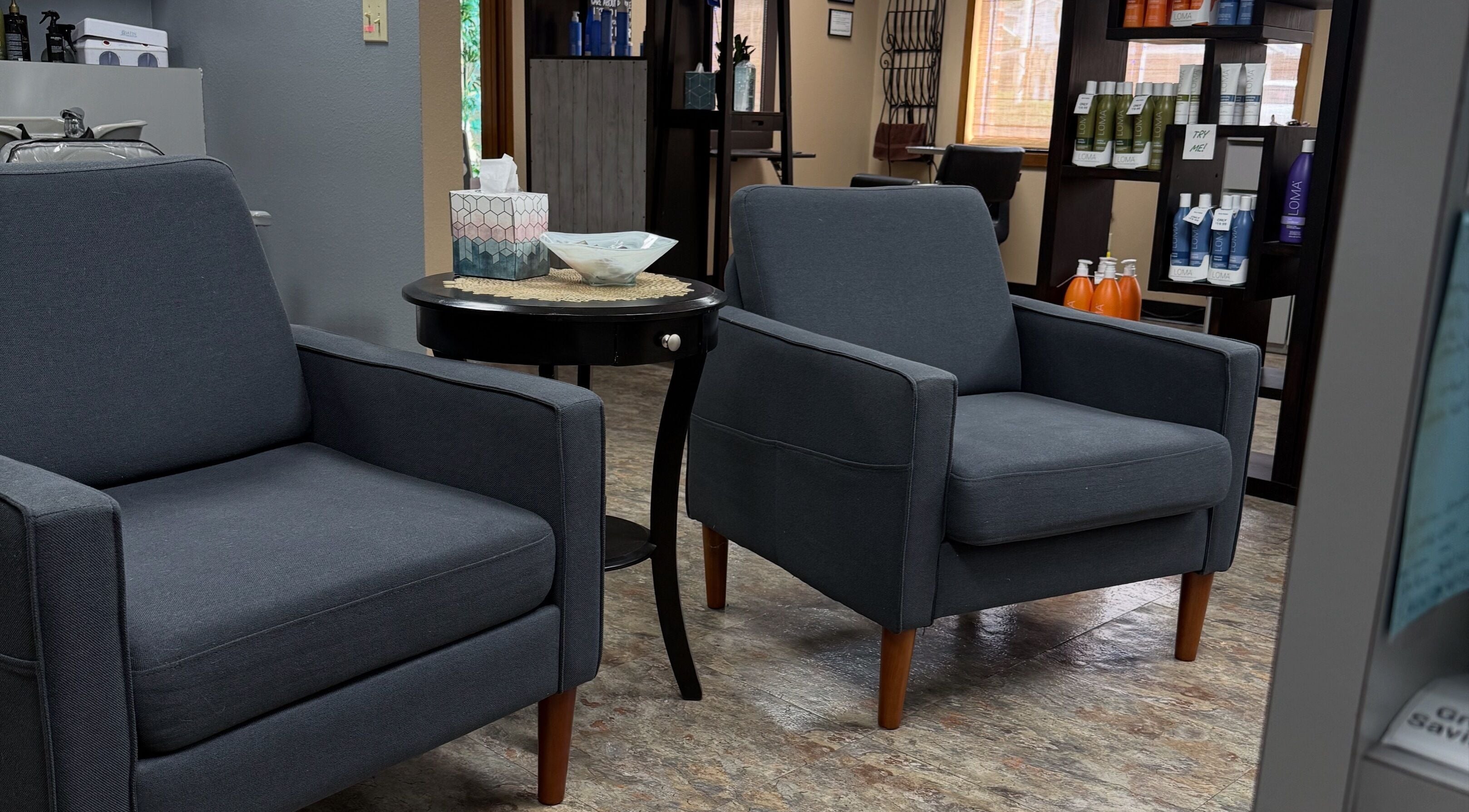 Comfortable seating area at Abrianna Kelly in Everett, Washington, US, featuring modern armchairs and stylish decor.