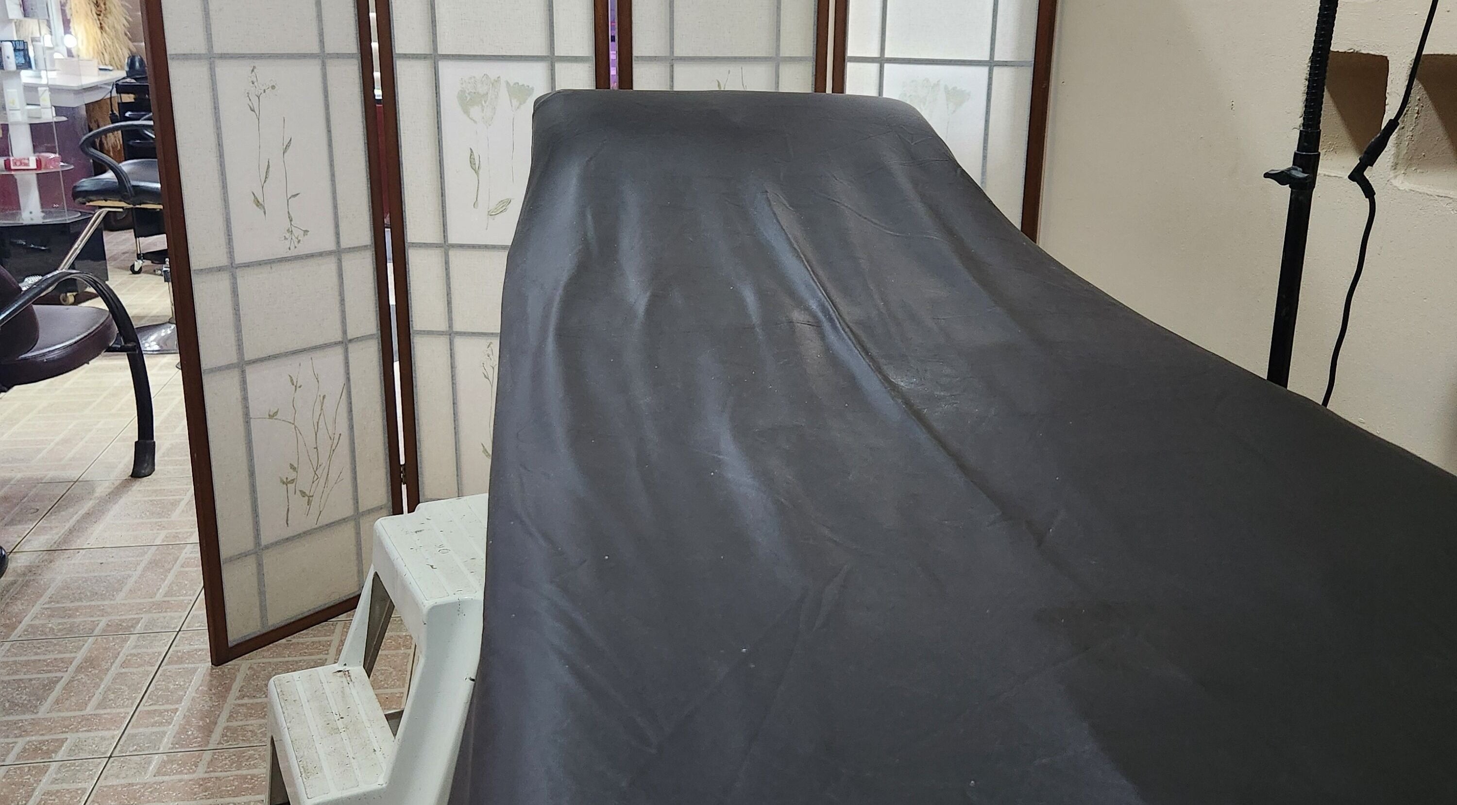 Massage table in serene room at Beauty by Pascalle, Paramaribo Noord, SR.