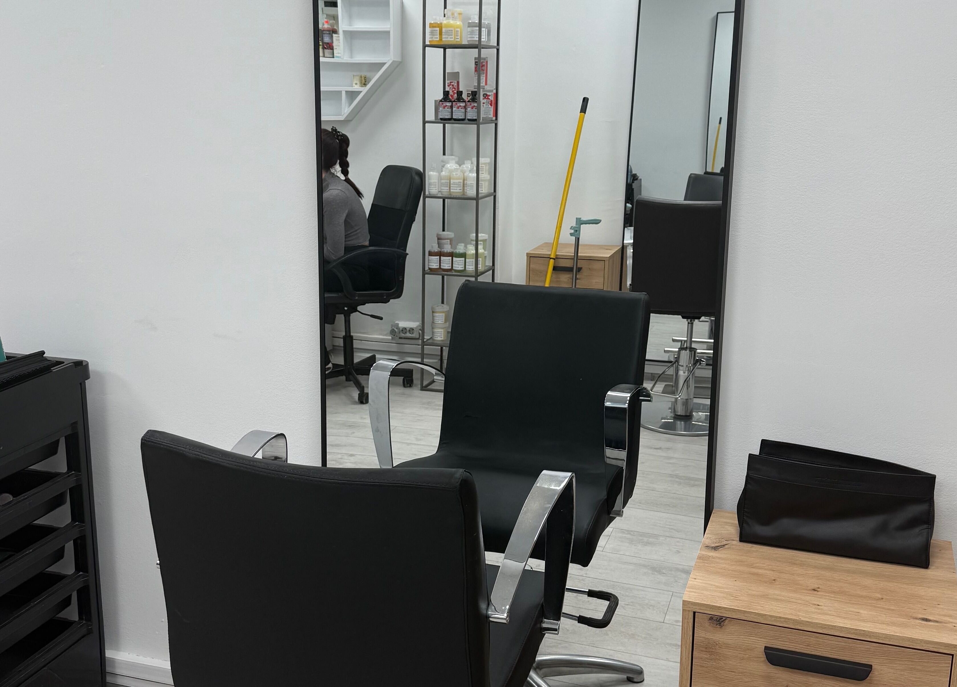 Modern salon chairs and styling area at MM HAIR STUDIO, Sofia, Sofia, BG.