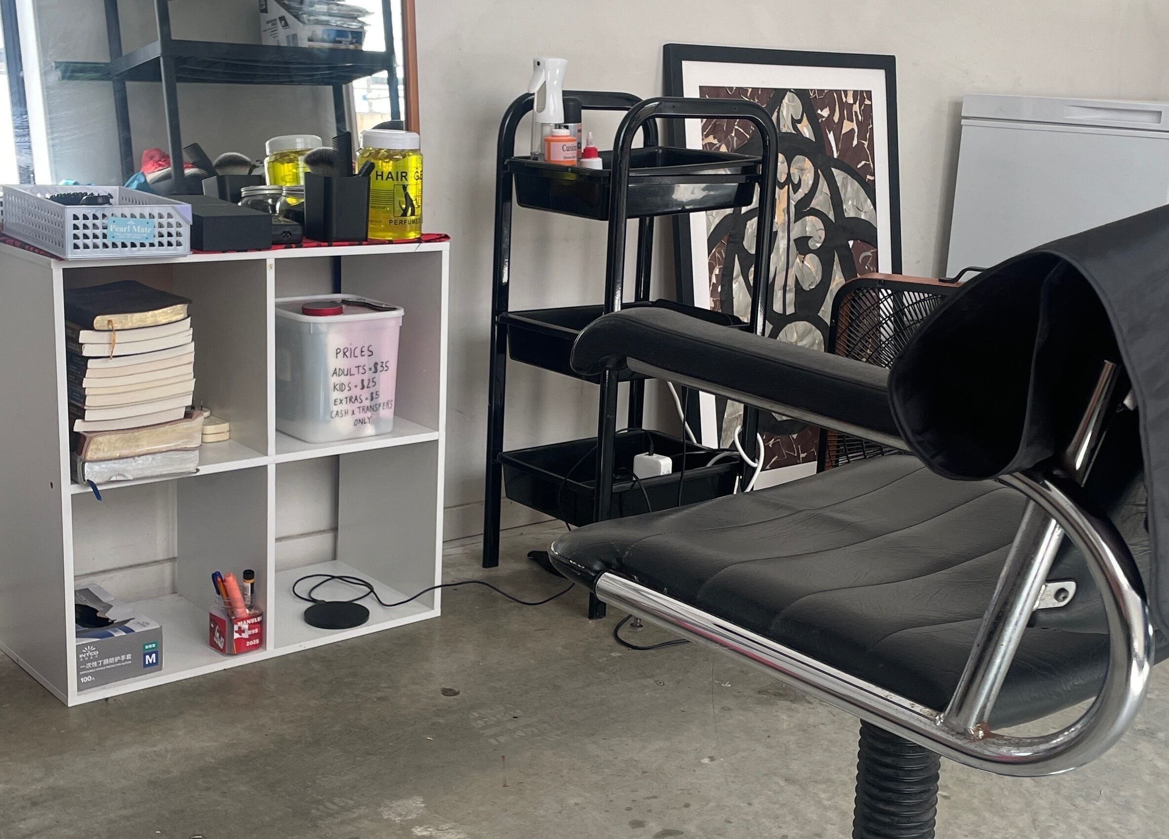 Stylish salon interior at South AKL cuts 09, Auckland, Auckland, NZ featuring a modern styling chair.