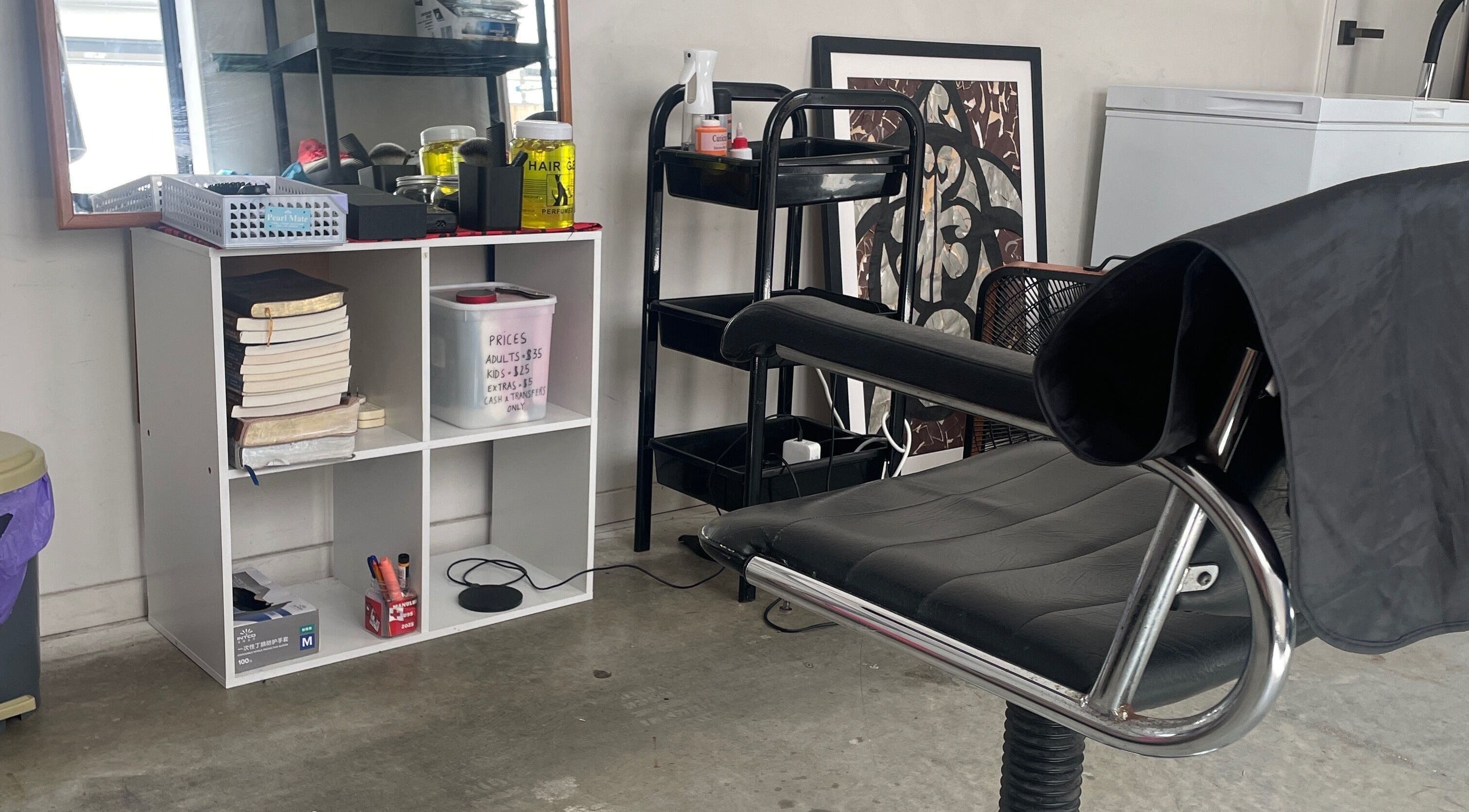 Stylish salon interior at South AKL cuts 09, Auckland, Auckland, NZ featuring a modern styling chair.