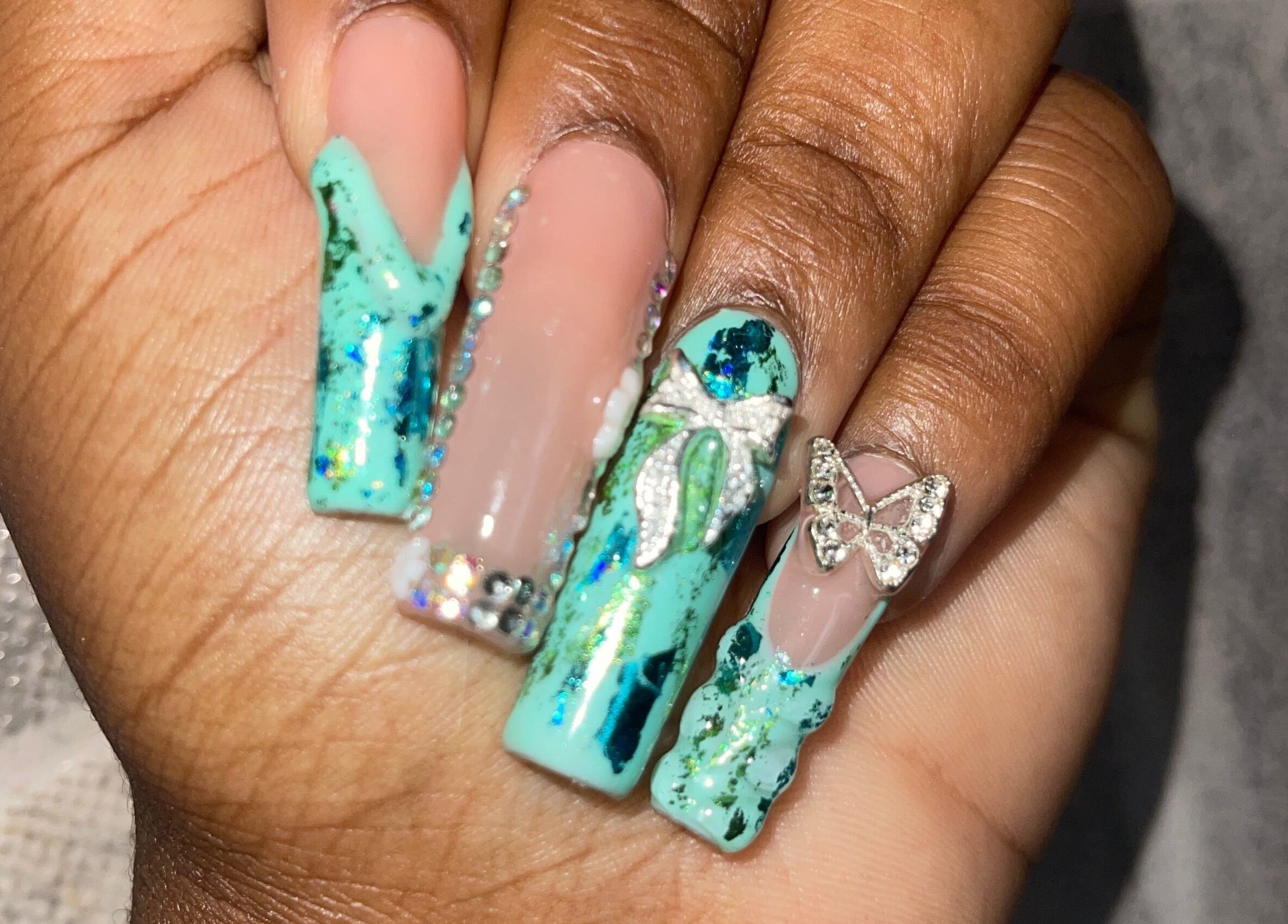 Stylish turquoise nail design with gems at Klawed.bymiah, Lowthers Hill, Christ Church, BB.